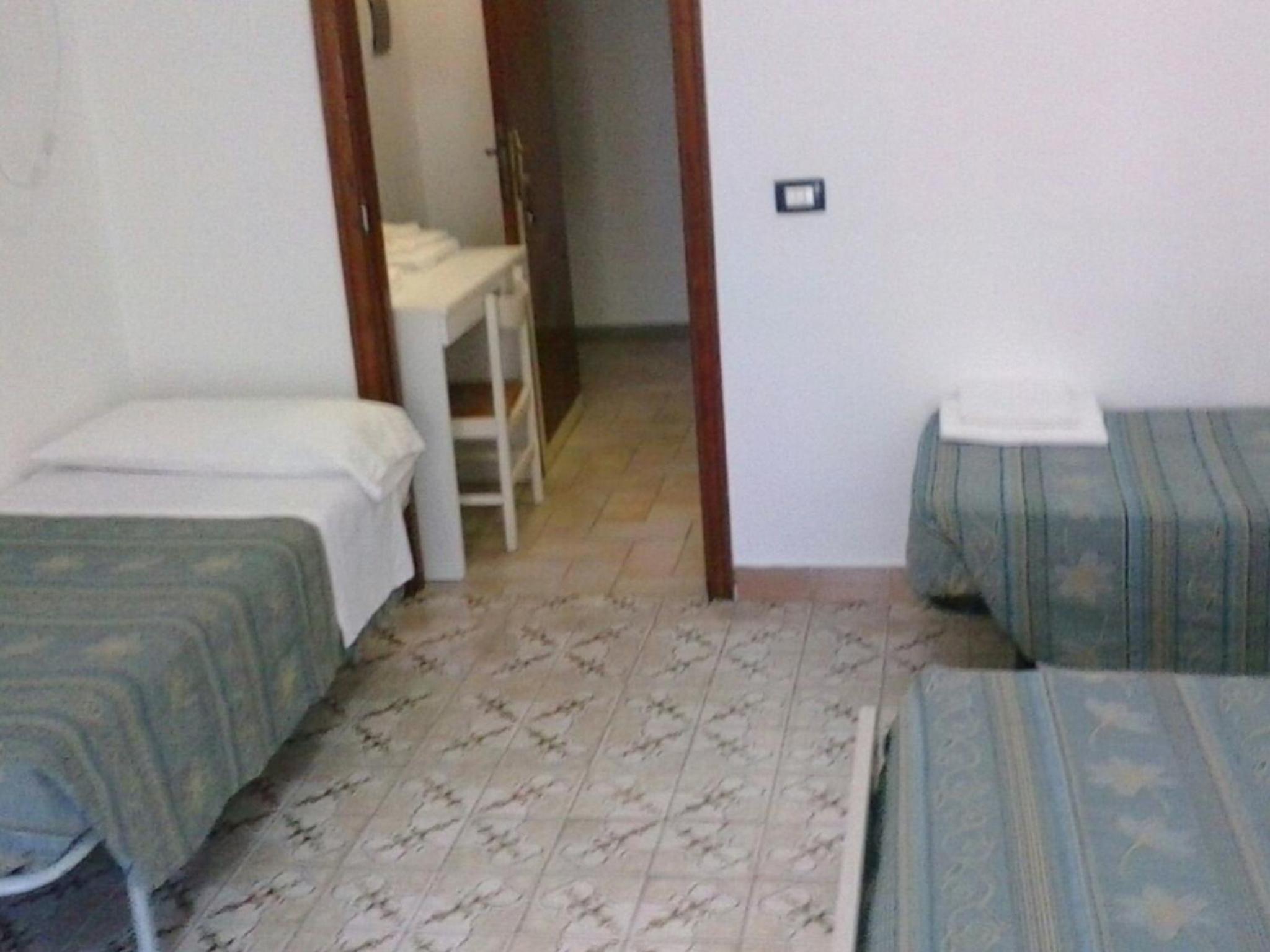 Quadruple Room with Balcony - Photo 2