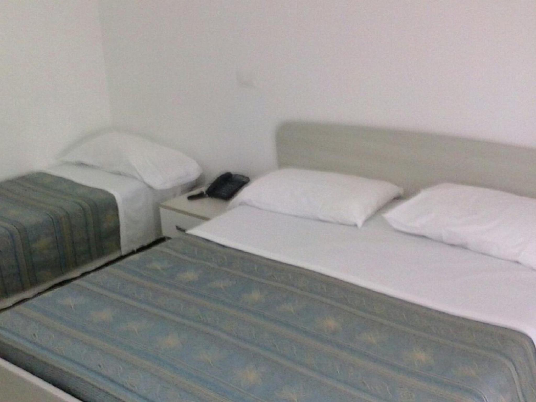 Quadruple Room with Balcony - Photo 4