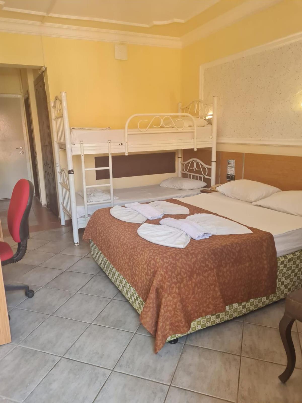 Economy Quadruple Room with Shared Bathroom