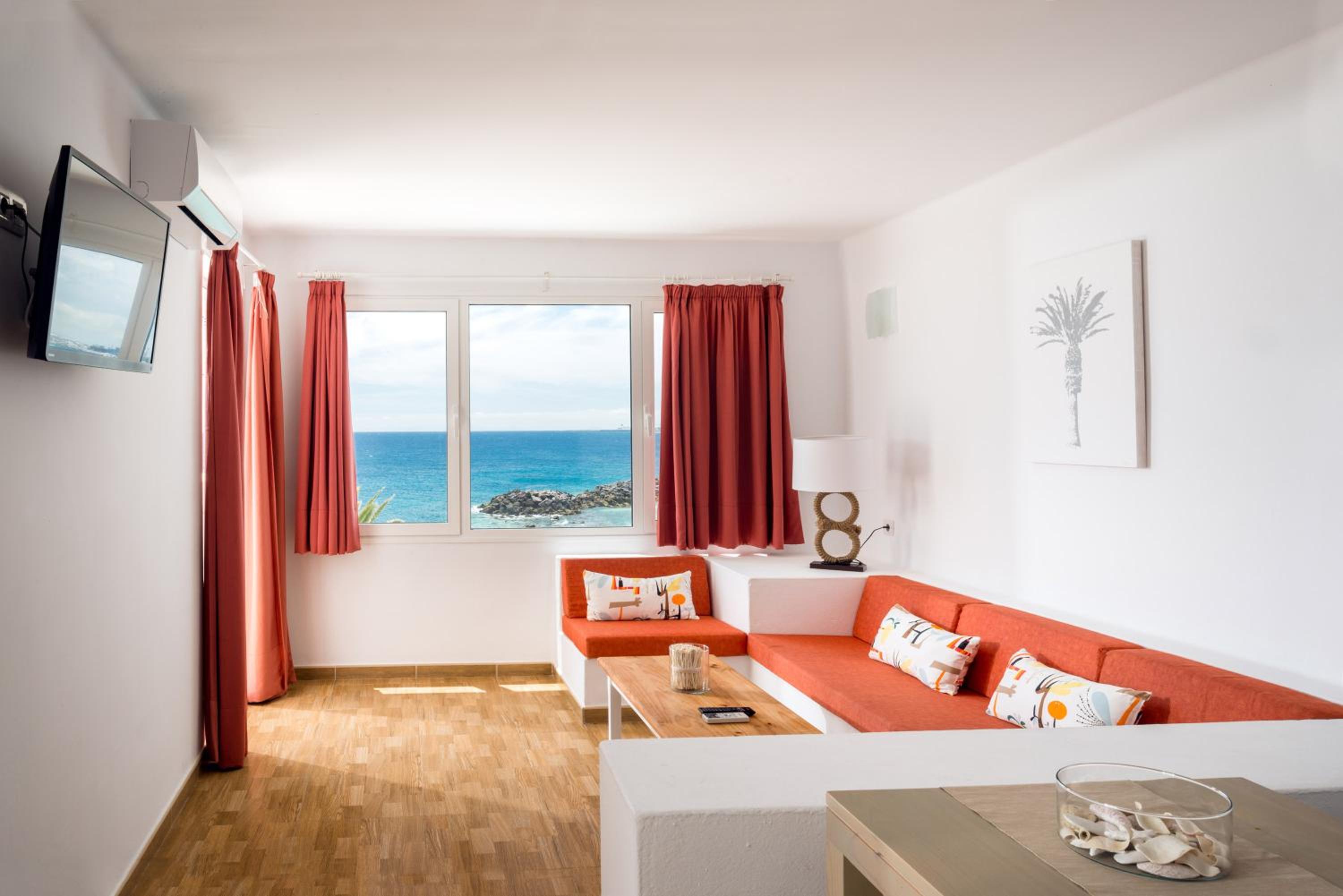 Suite de un dormitorio con vista al mar