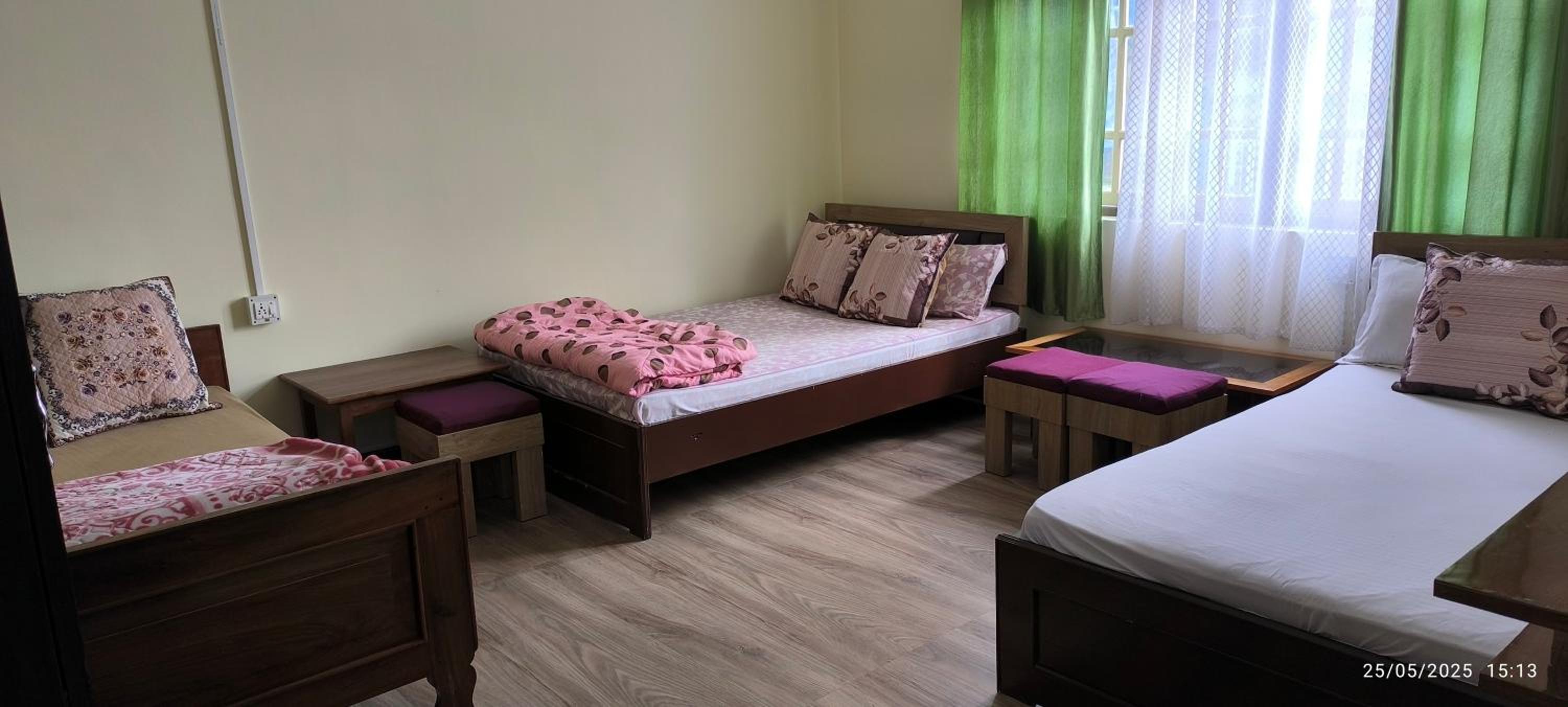 Basic Triple Room with Shared Bathroom photo 2