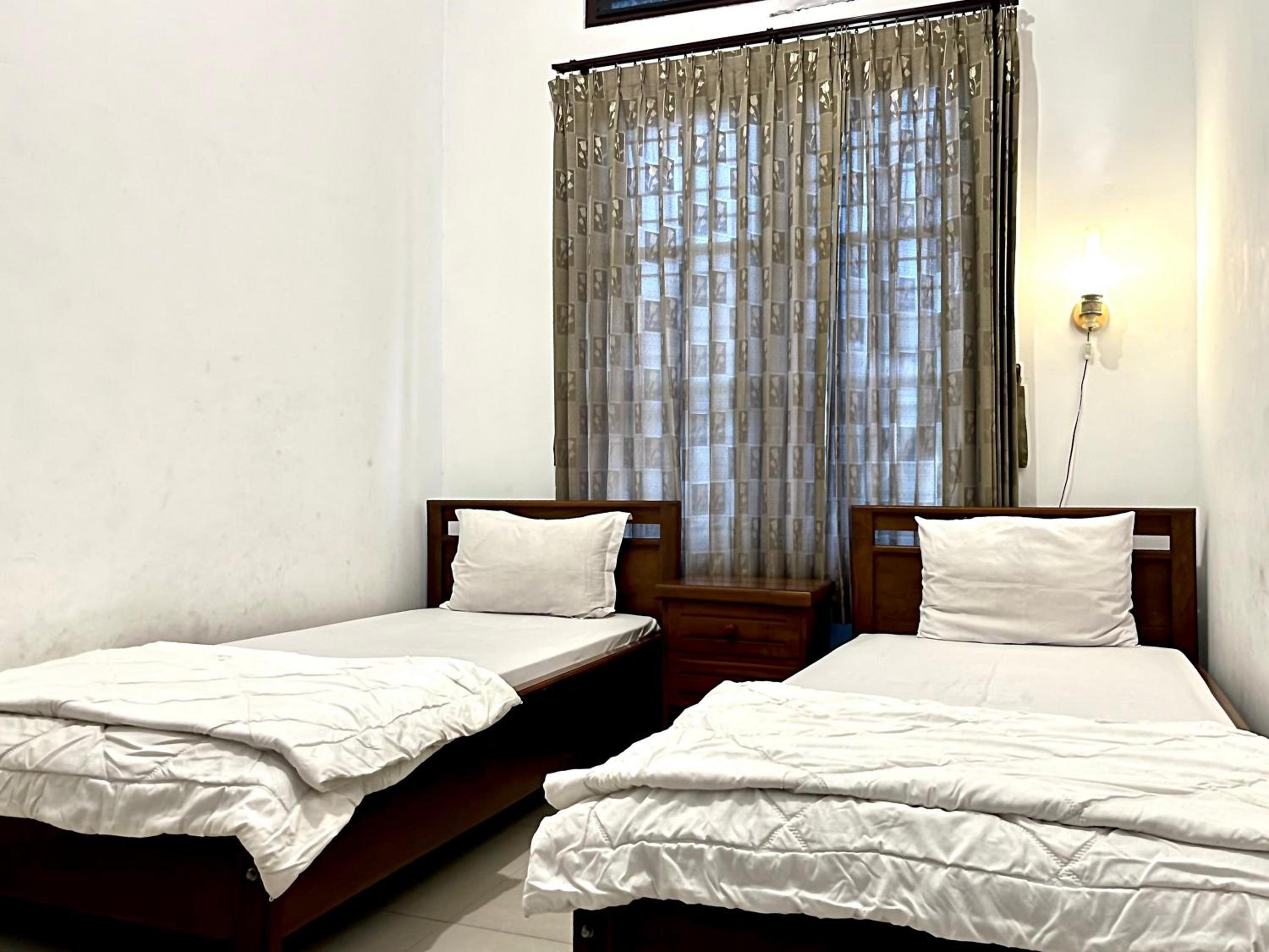 Twin Room - Photo 8