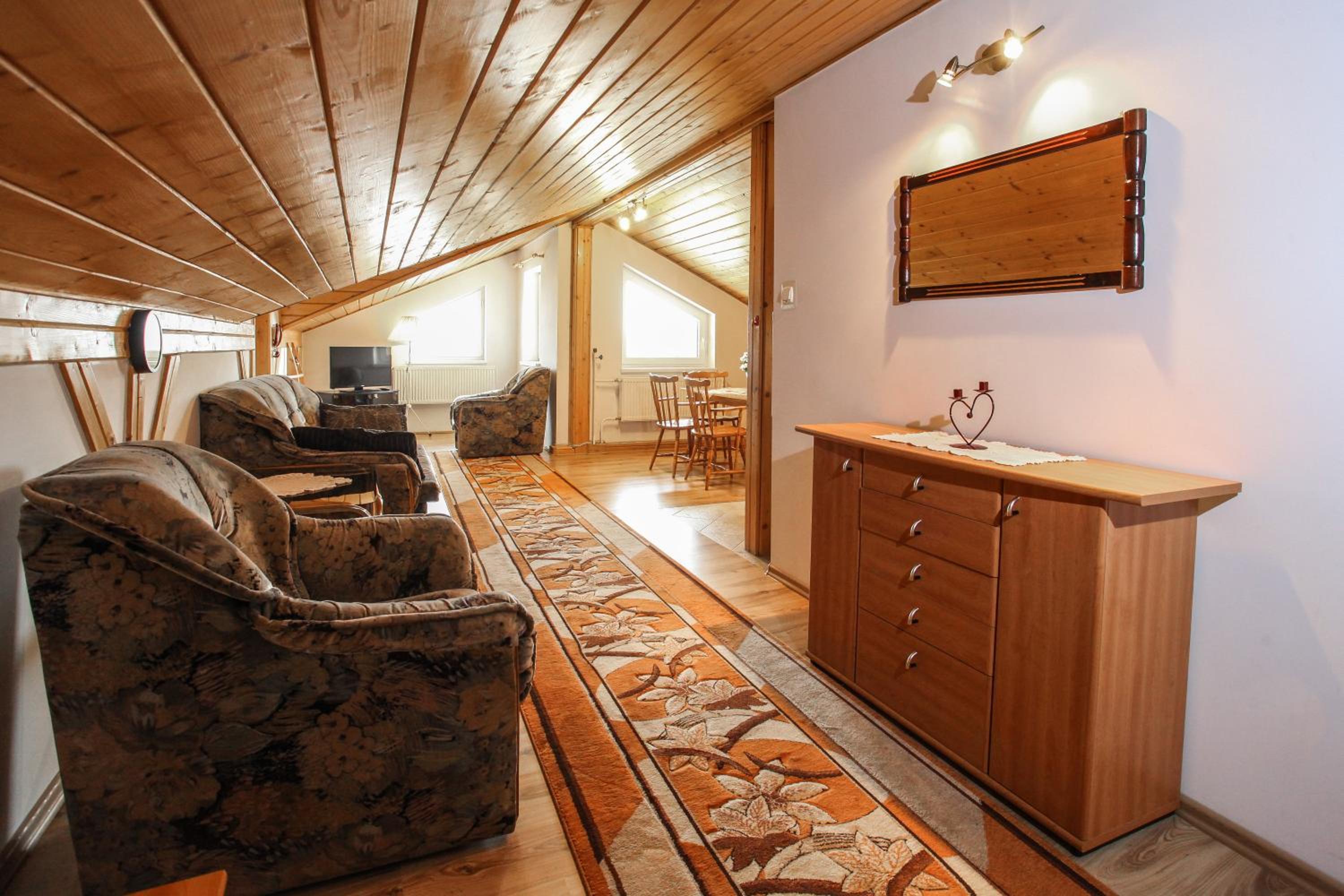 Three-Bedroom Apartment Attic photo 1