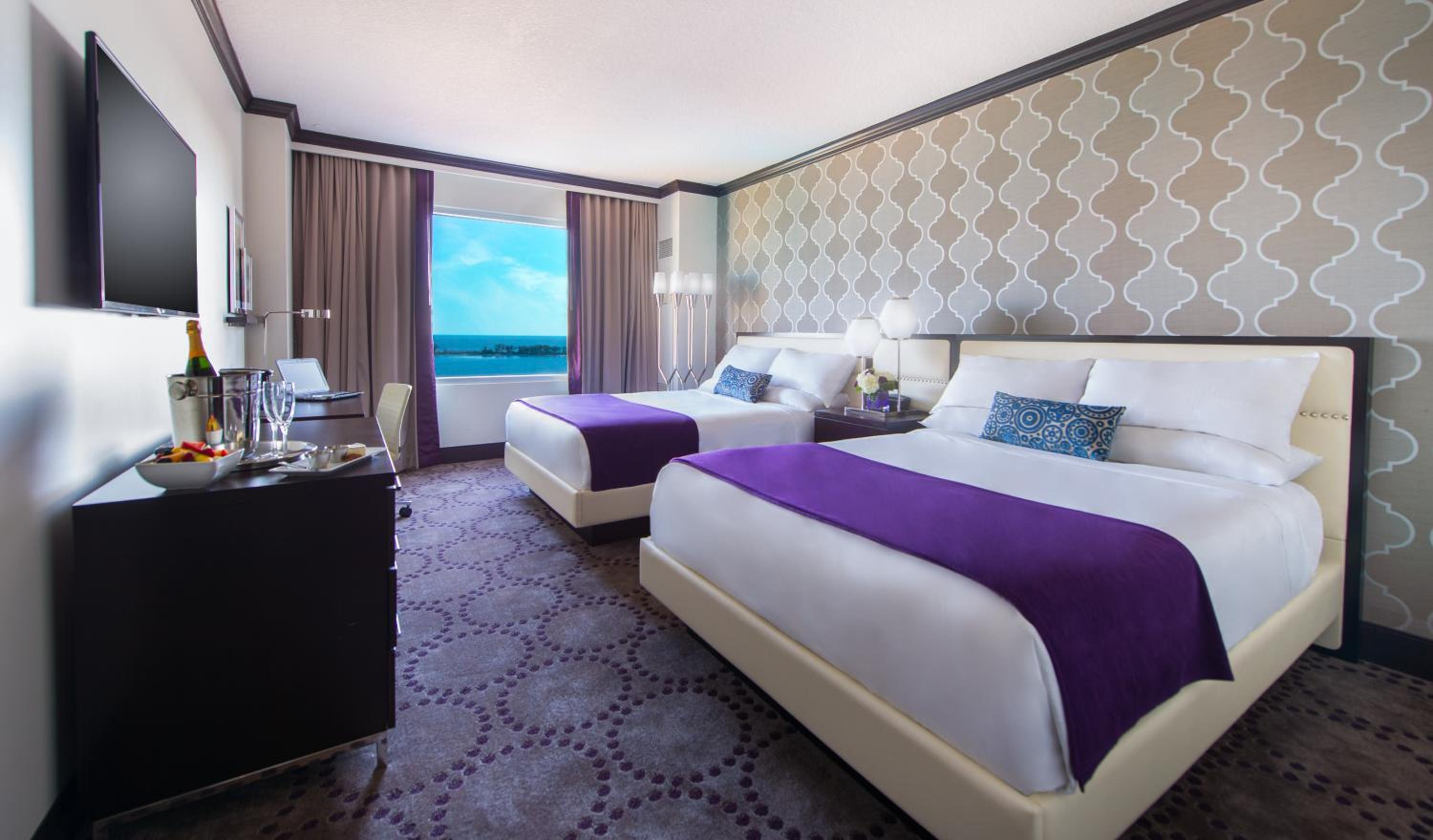 Deluxe Queen Room with Two Queen Beds - Photo 1