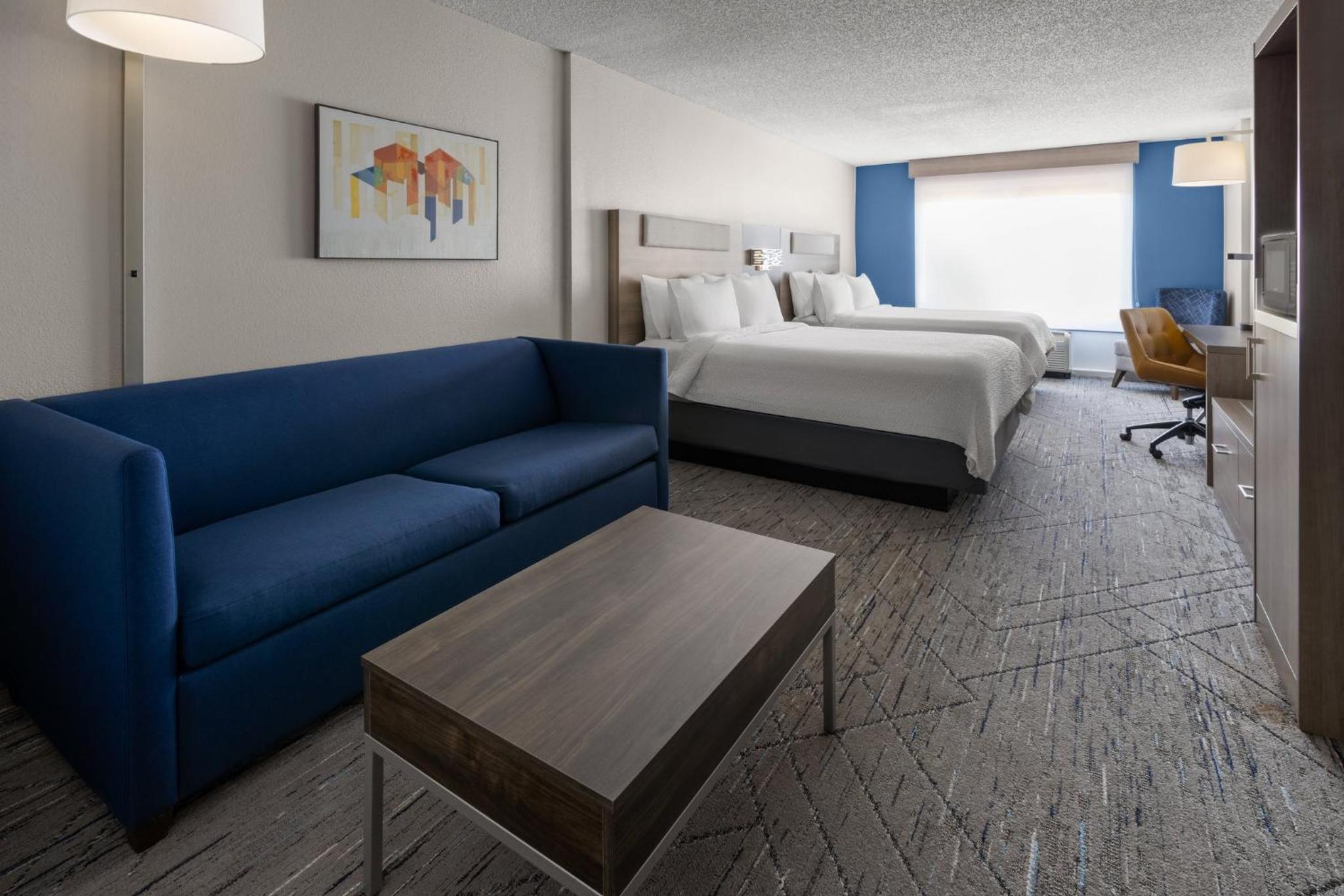 Queen Suite with Two Queen Beds and Sofa Bed - Photo 1