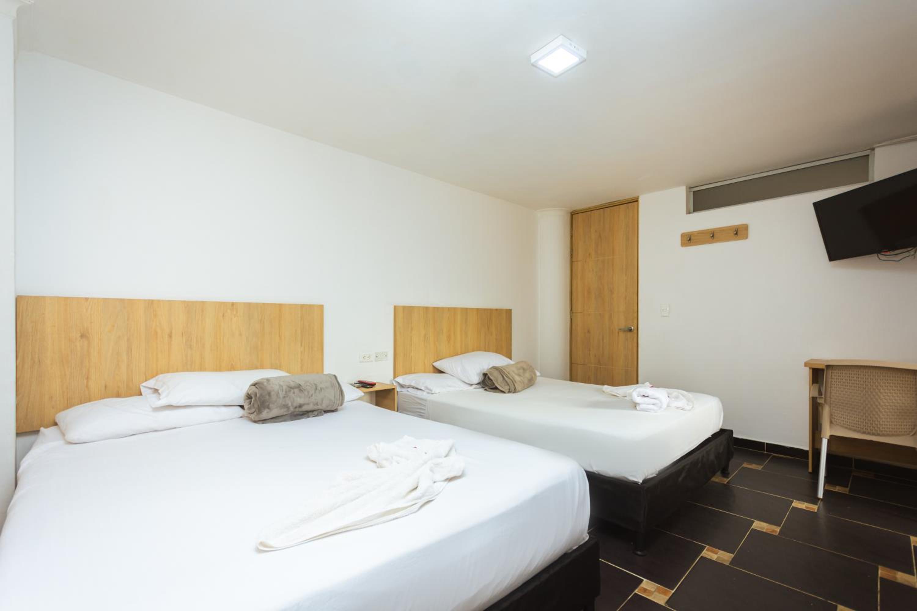 Quadruple Room with Balcony photo 3