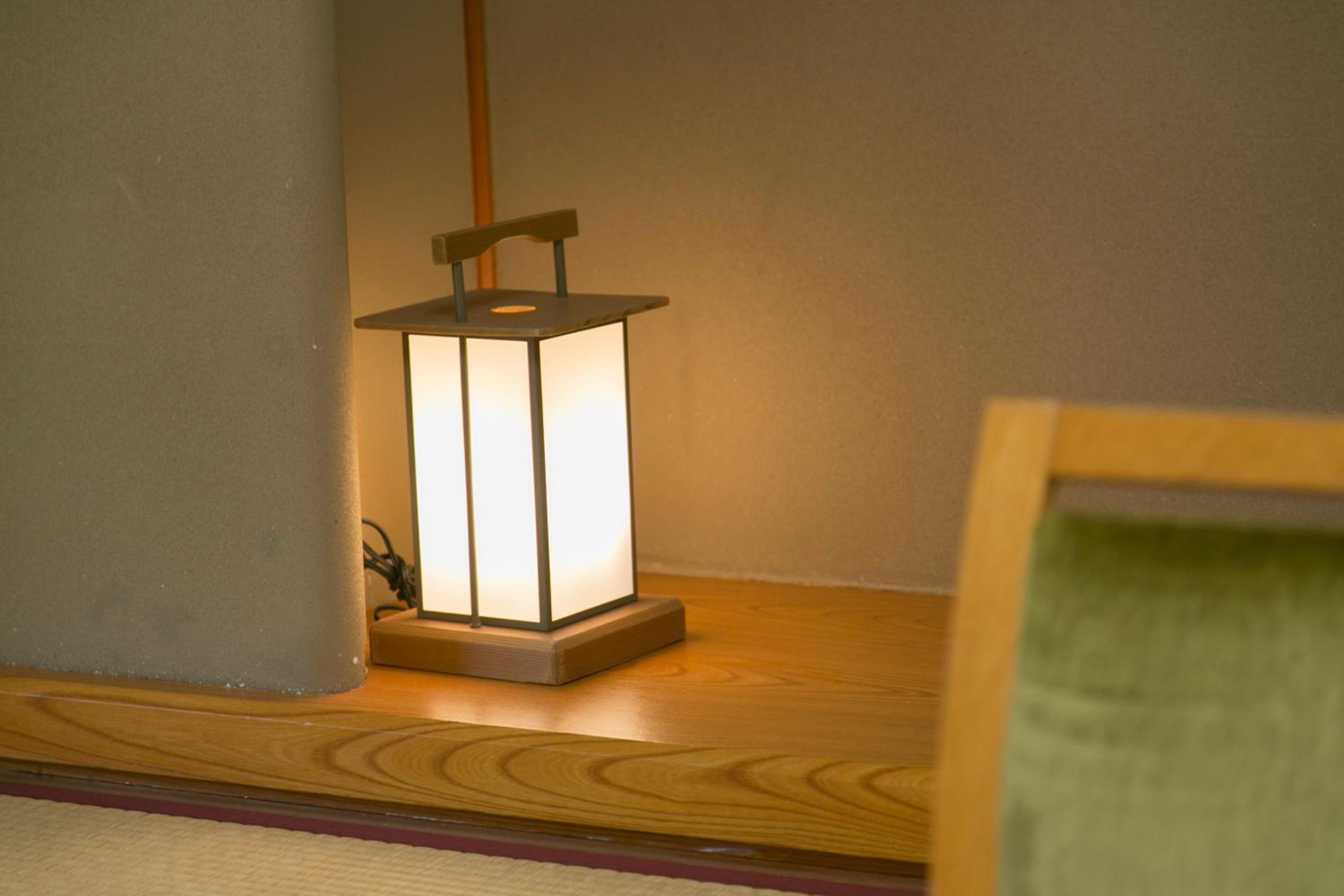 Japanese-Style Room With River and Forest View photo 1