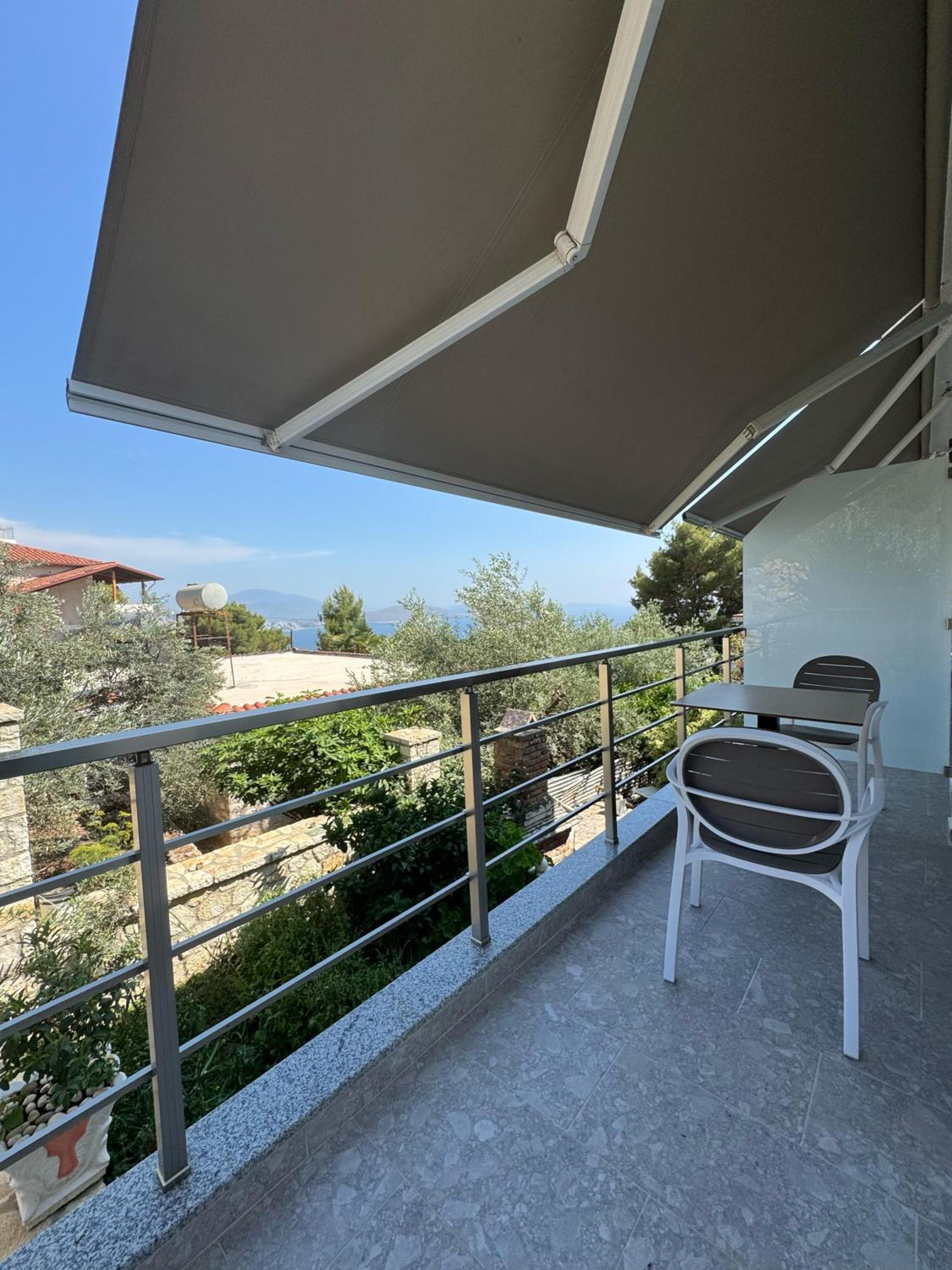One-Bedroom Apartment with Balcony and Sea View