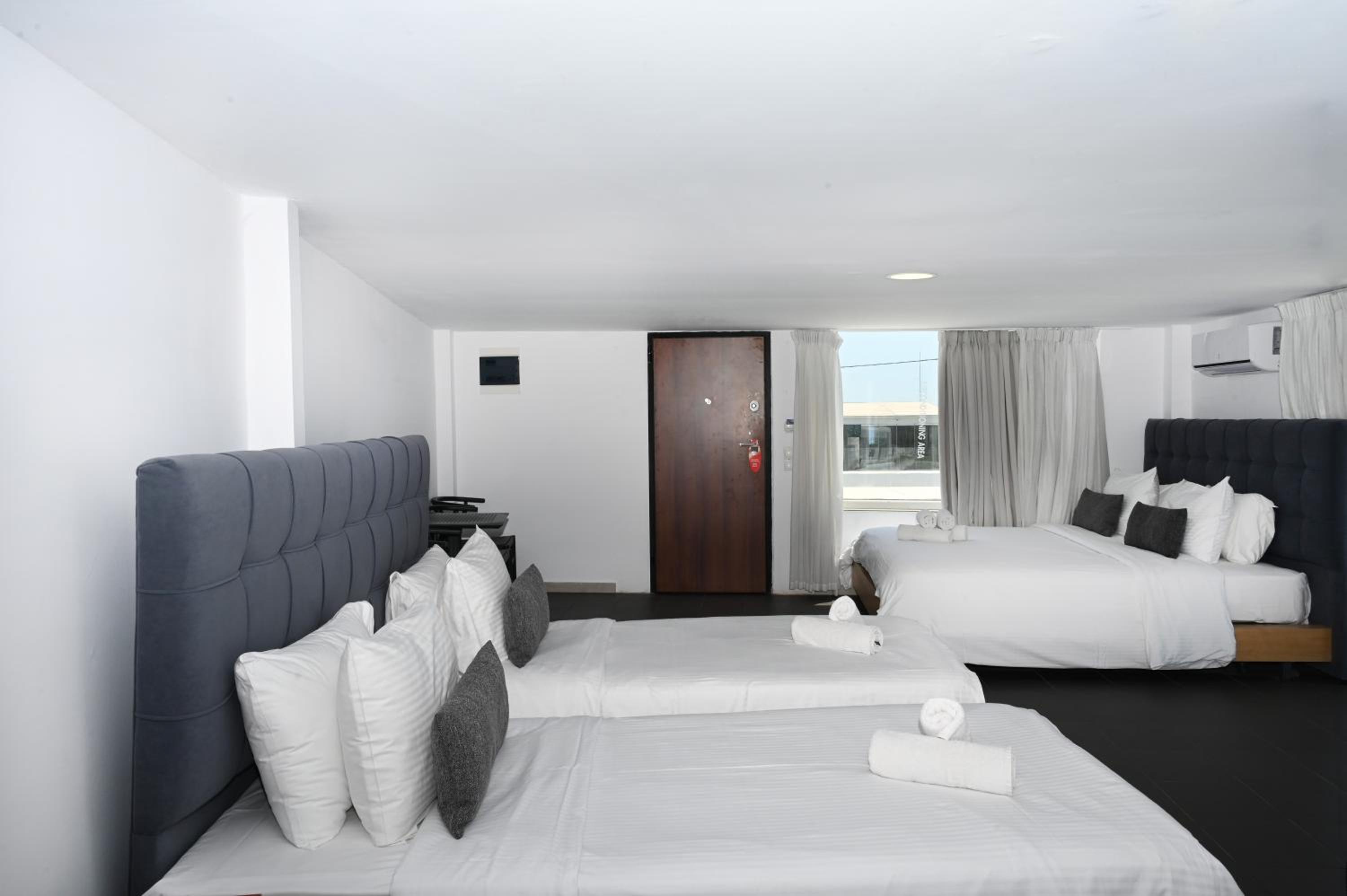 Quadruple Room - Photo 1
