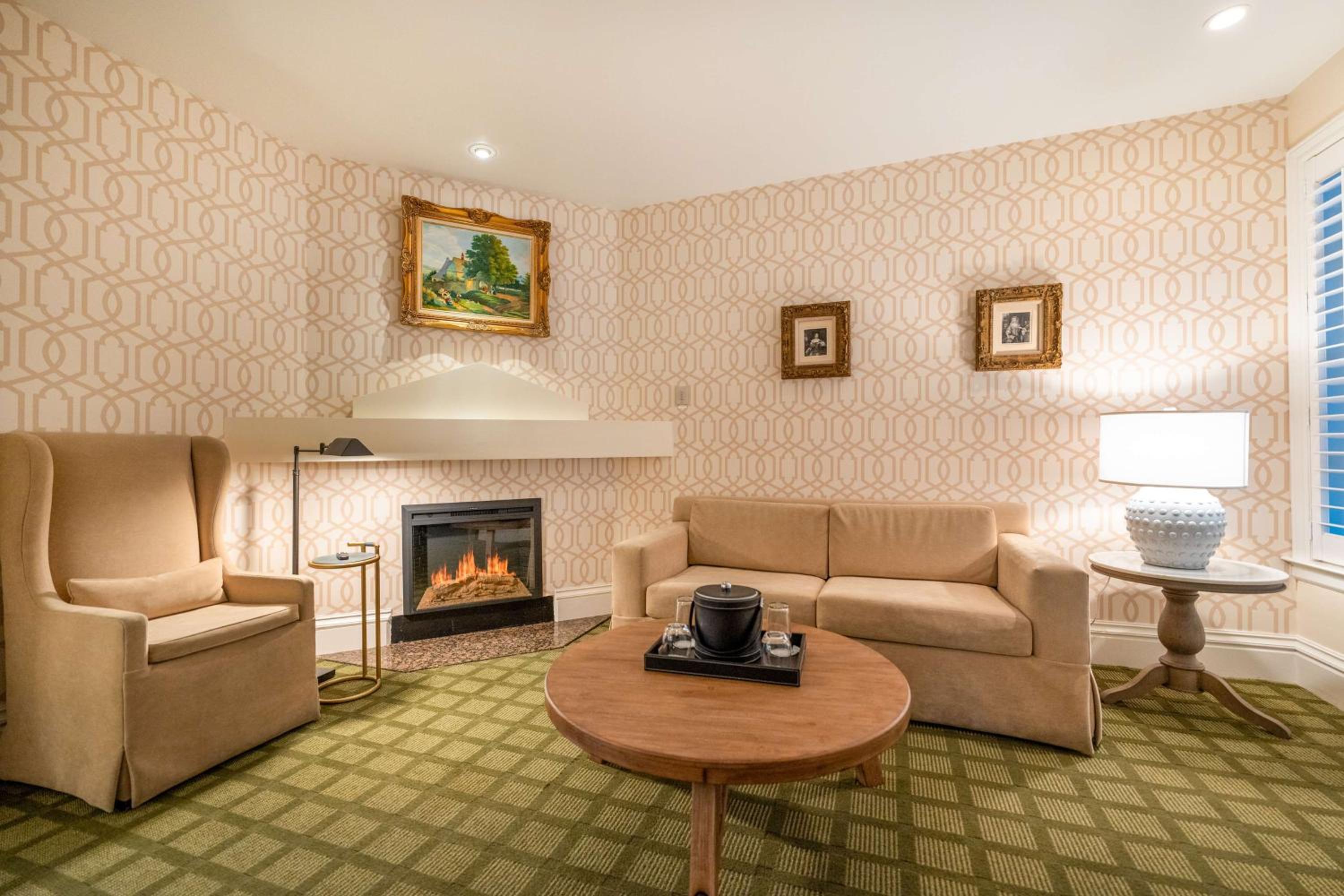 Queen Room with Sofa Bed, Fireplace, Living Area and Private Patio - Non-Smoking photo 2
