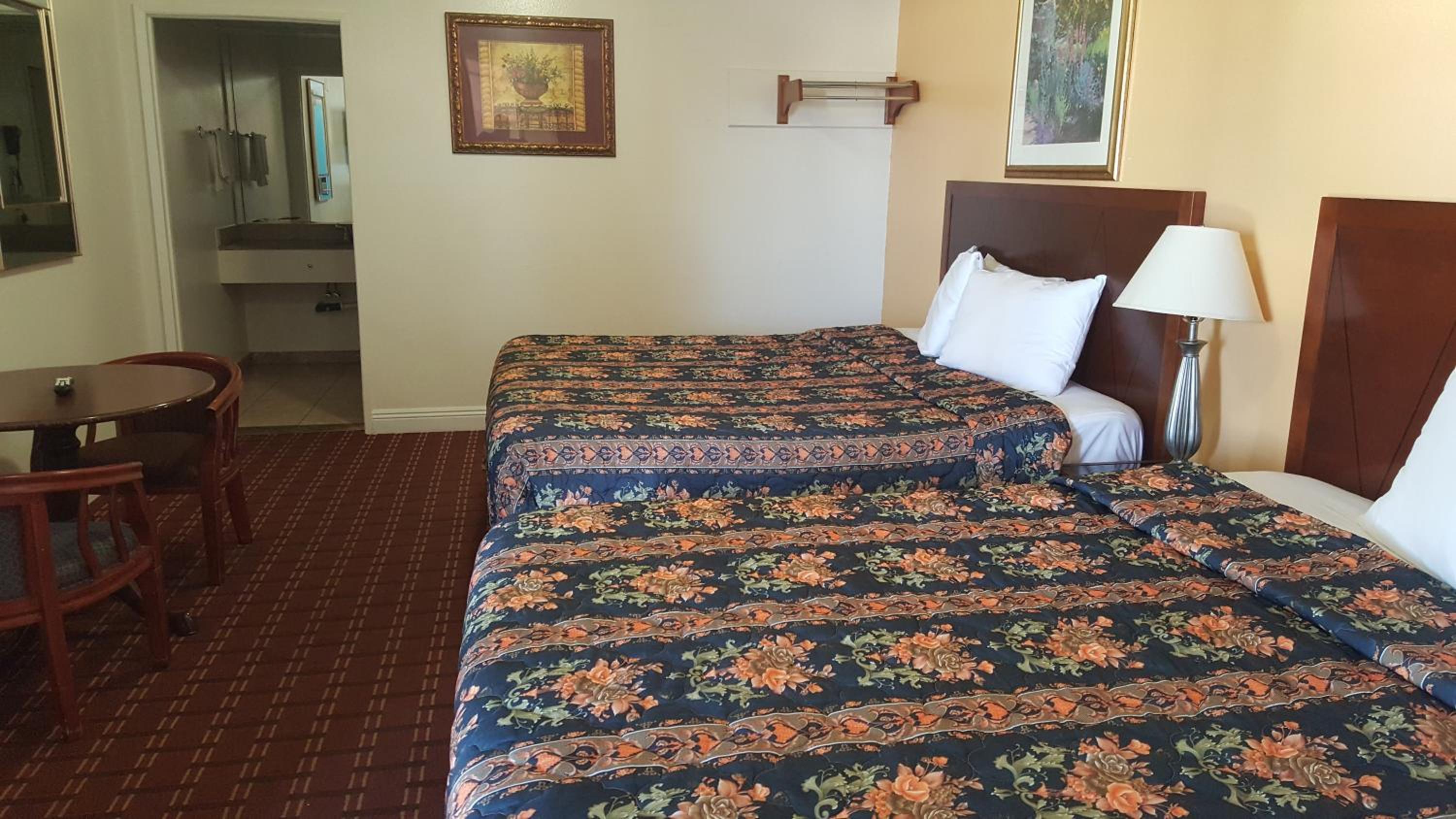 Deluxe King Room with Two King Beds, Non-Smoking - Photo 1