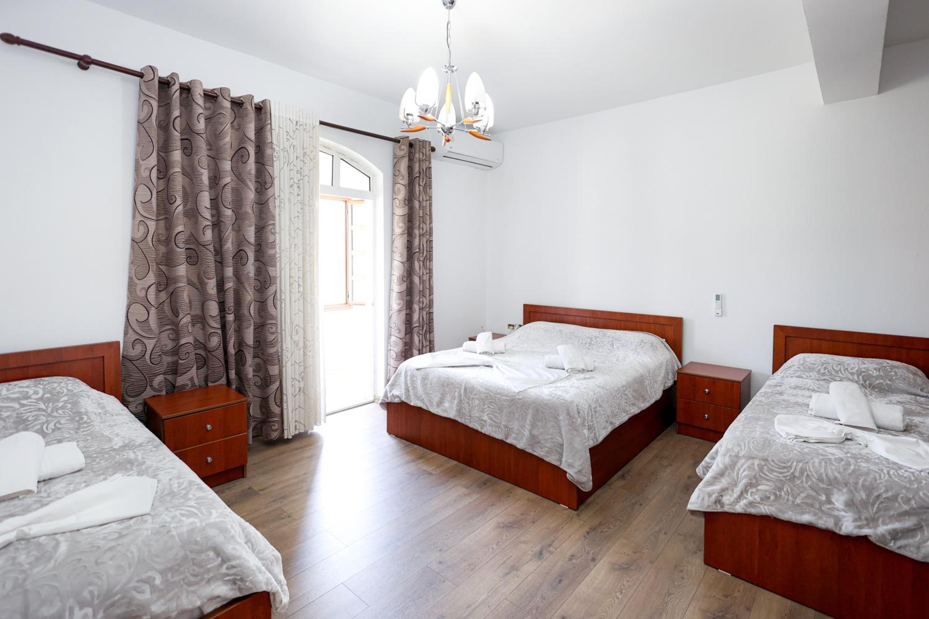 Quadruple Room with Balcony