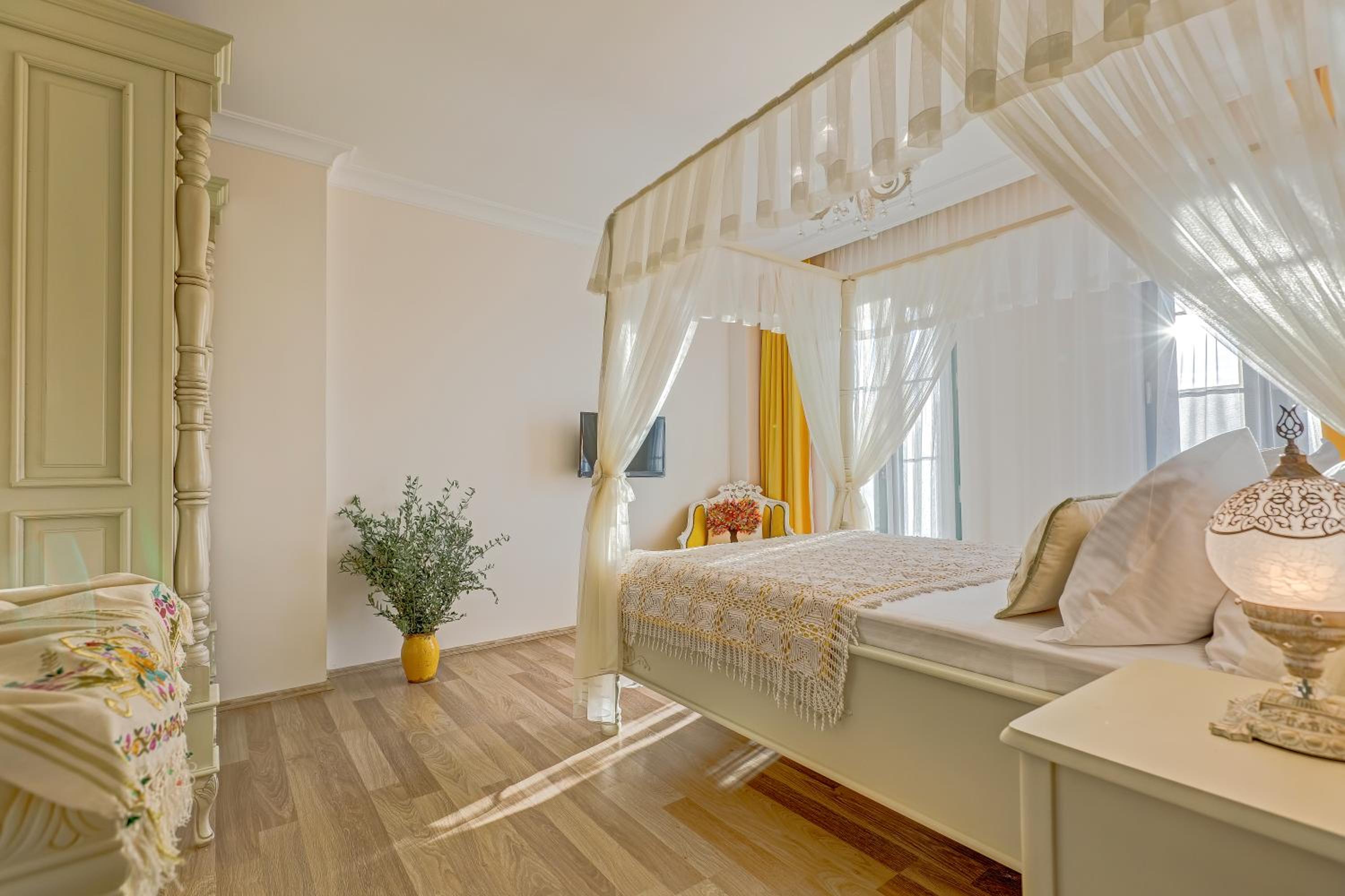 Upper Story Room with Draped Beds