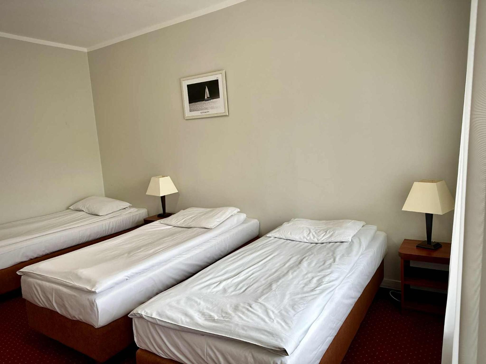 Economy Triple Room - Photo 2