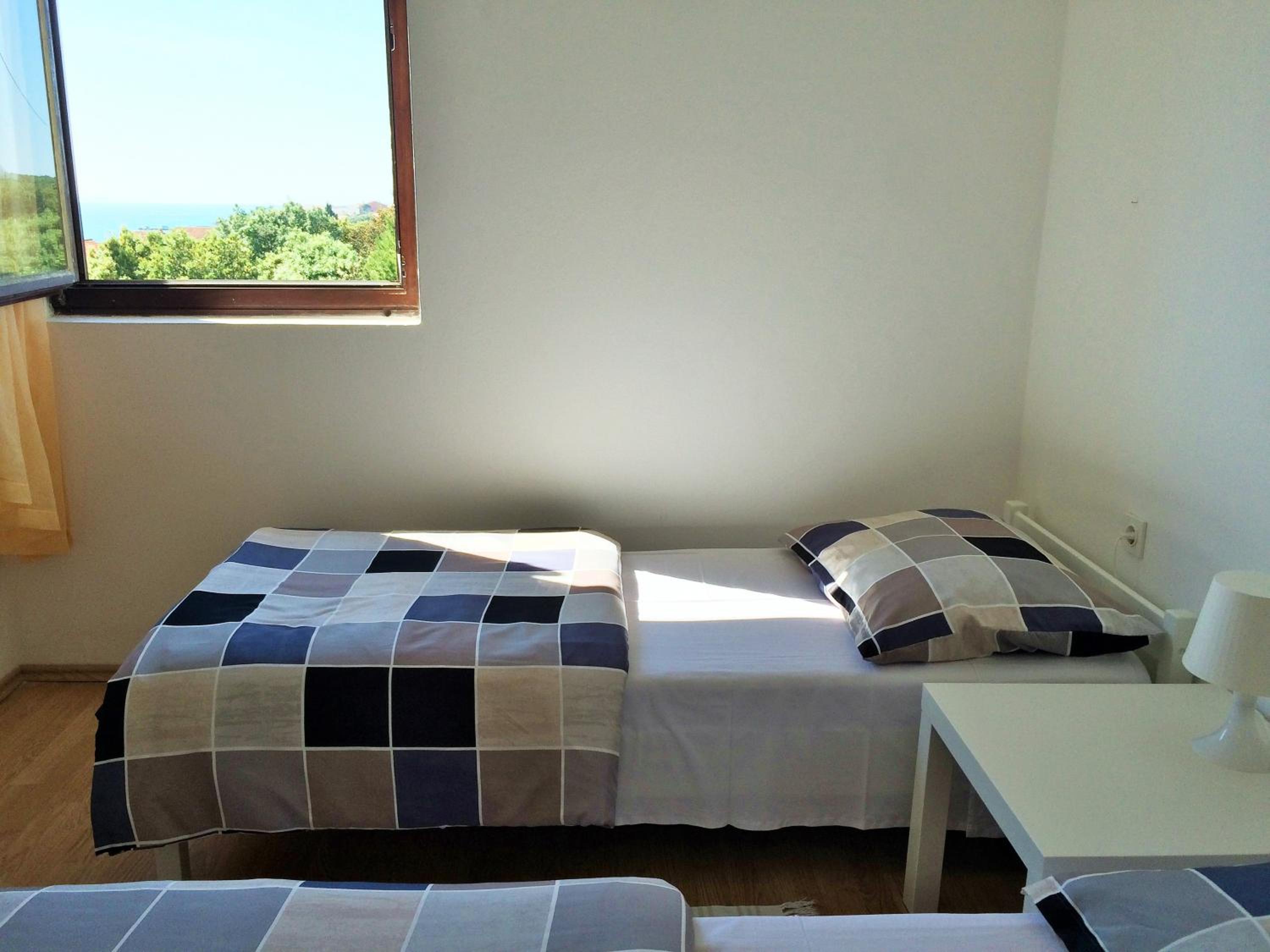 Two-Bedroom Apartment with Sofa Bed and Sea View photo 2