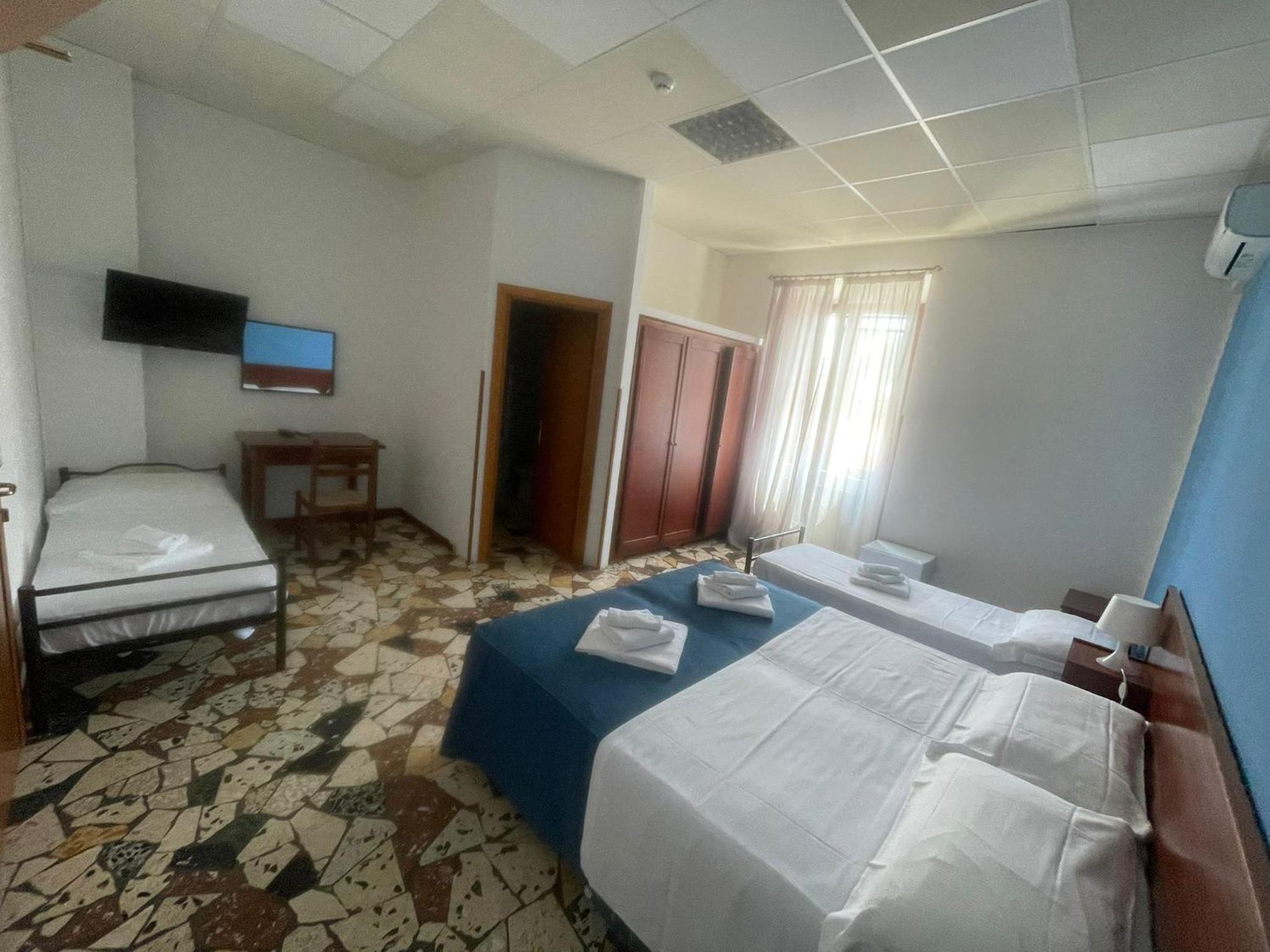 Standard Quadruple Room with Beach Package photo 1