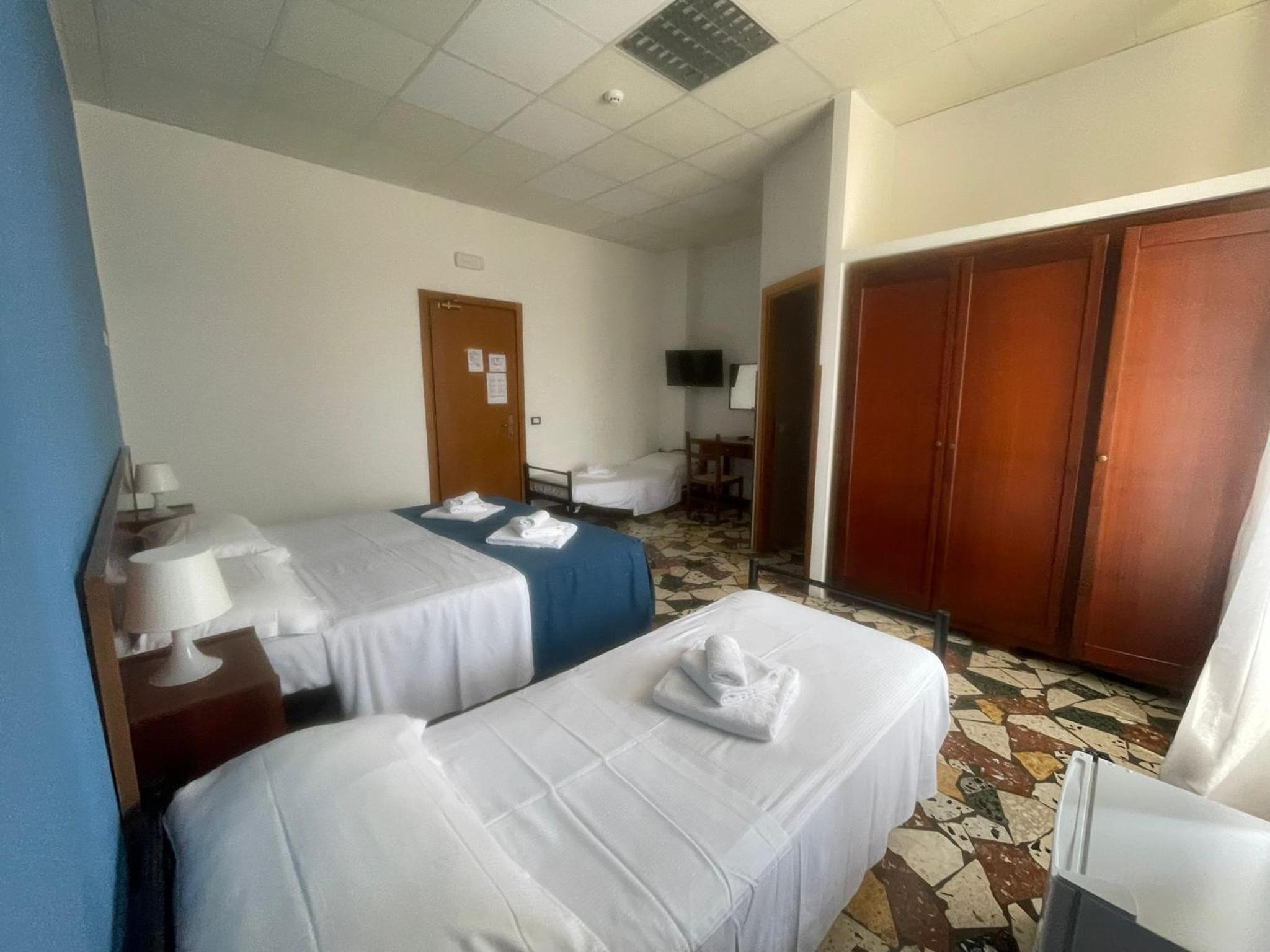 Standard Quadruple Room with Beach Package photo 3