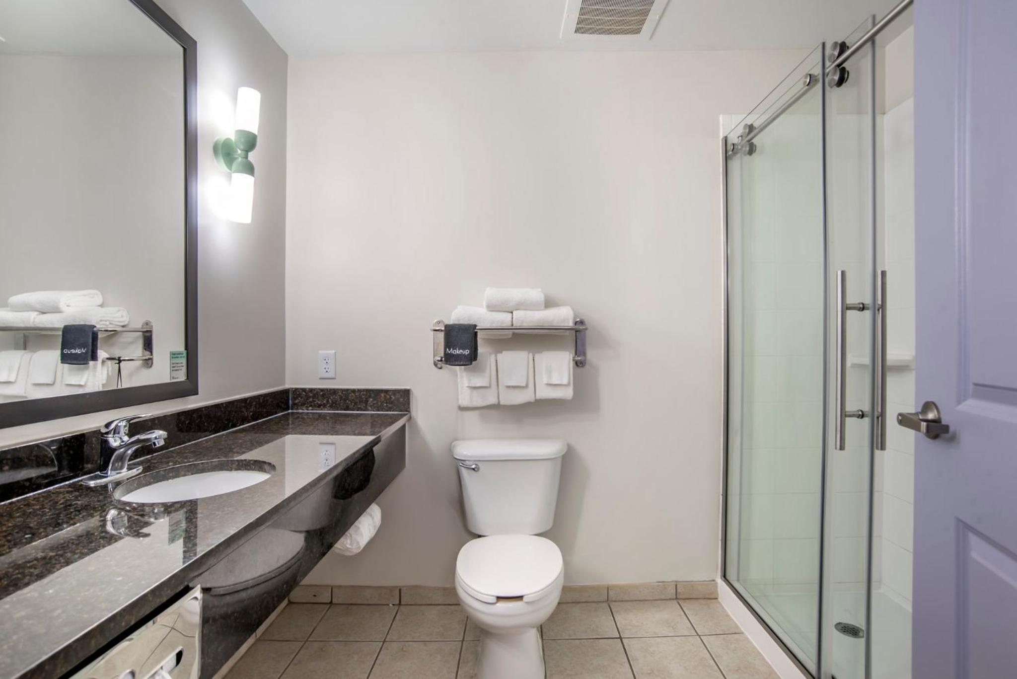 Standard Queen Room with Two Queen Beds and Walk-In Shower - Photo 2