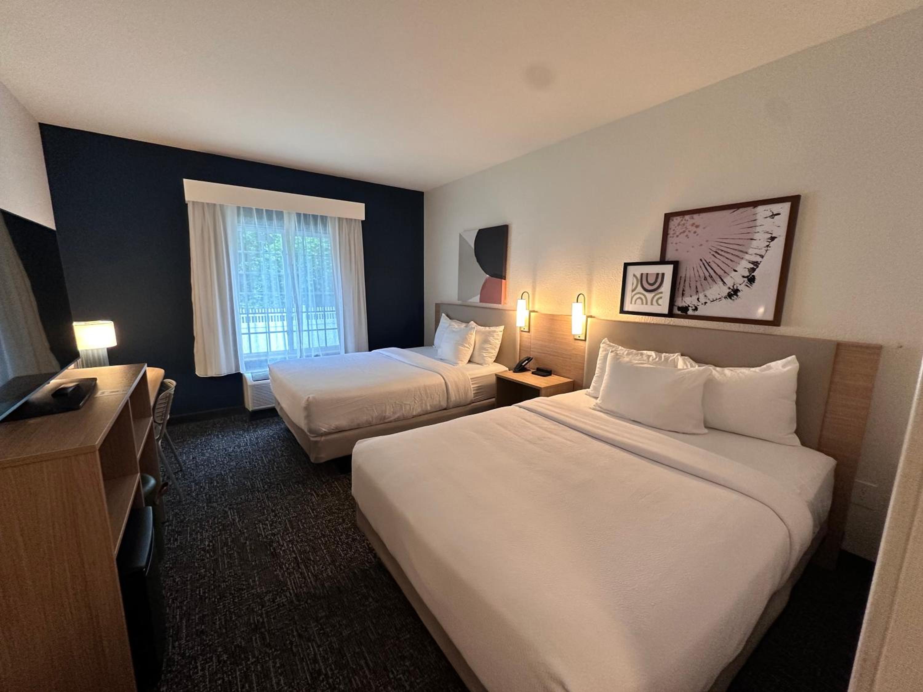Queen Room with Two Queen Beds - Photo 1