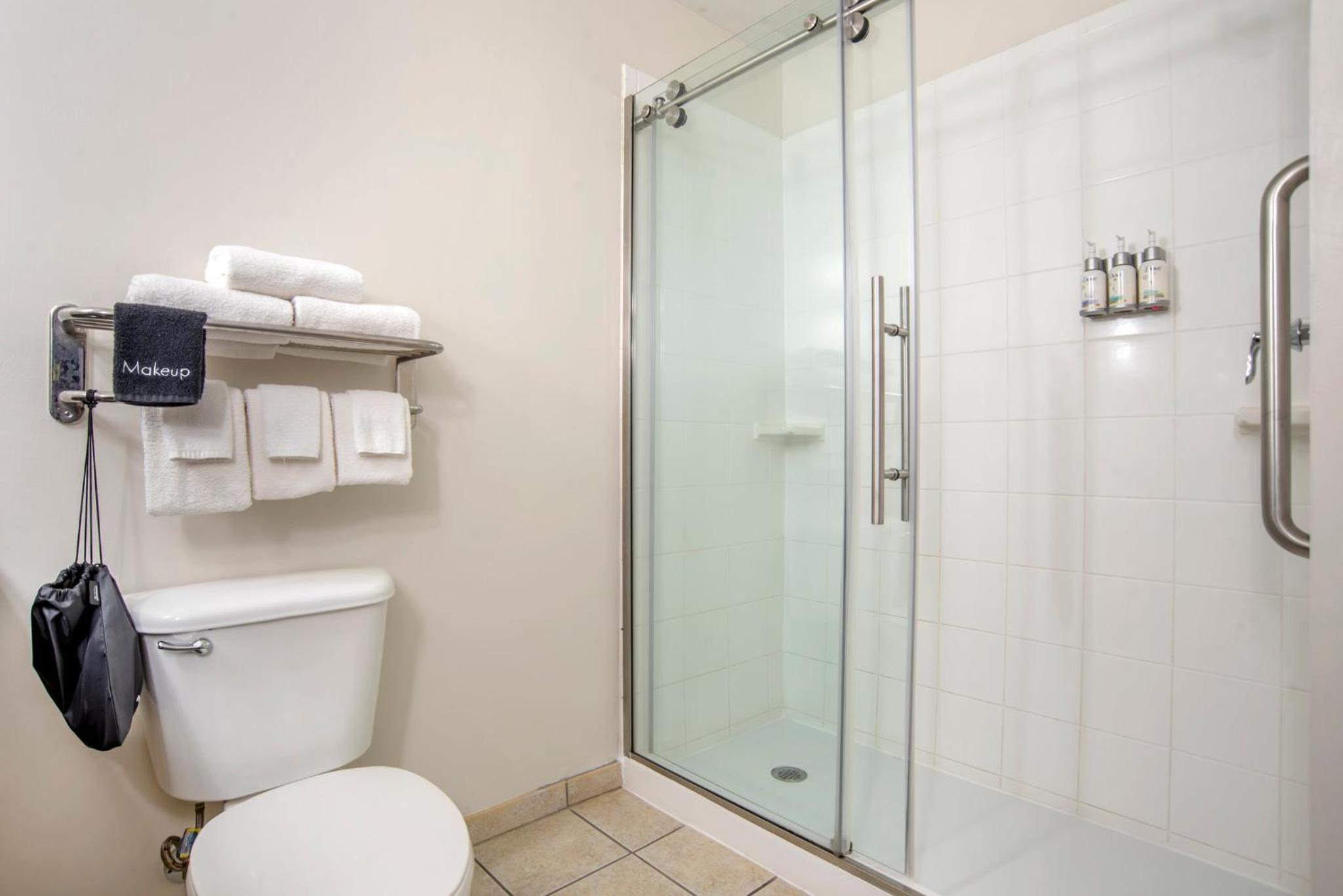 Standard Queen Room with Two Queen Beds and Walk-In Shower - Photo 1