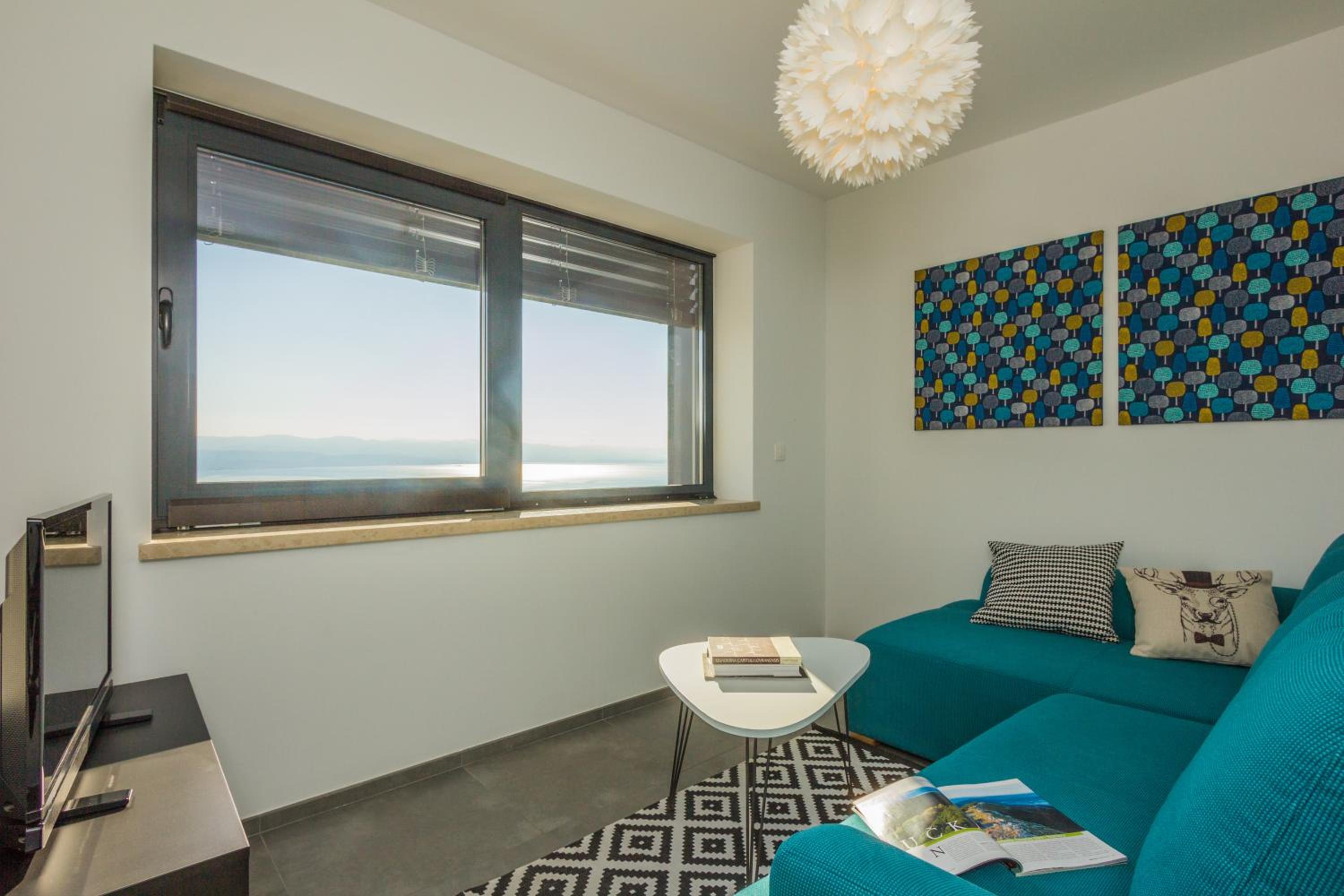 Two-Bedroom Apartment with Balcony and Sea View