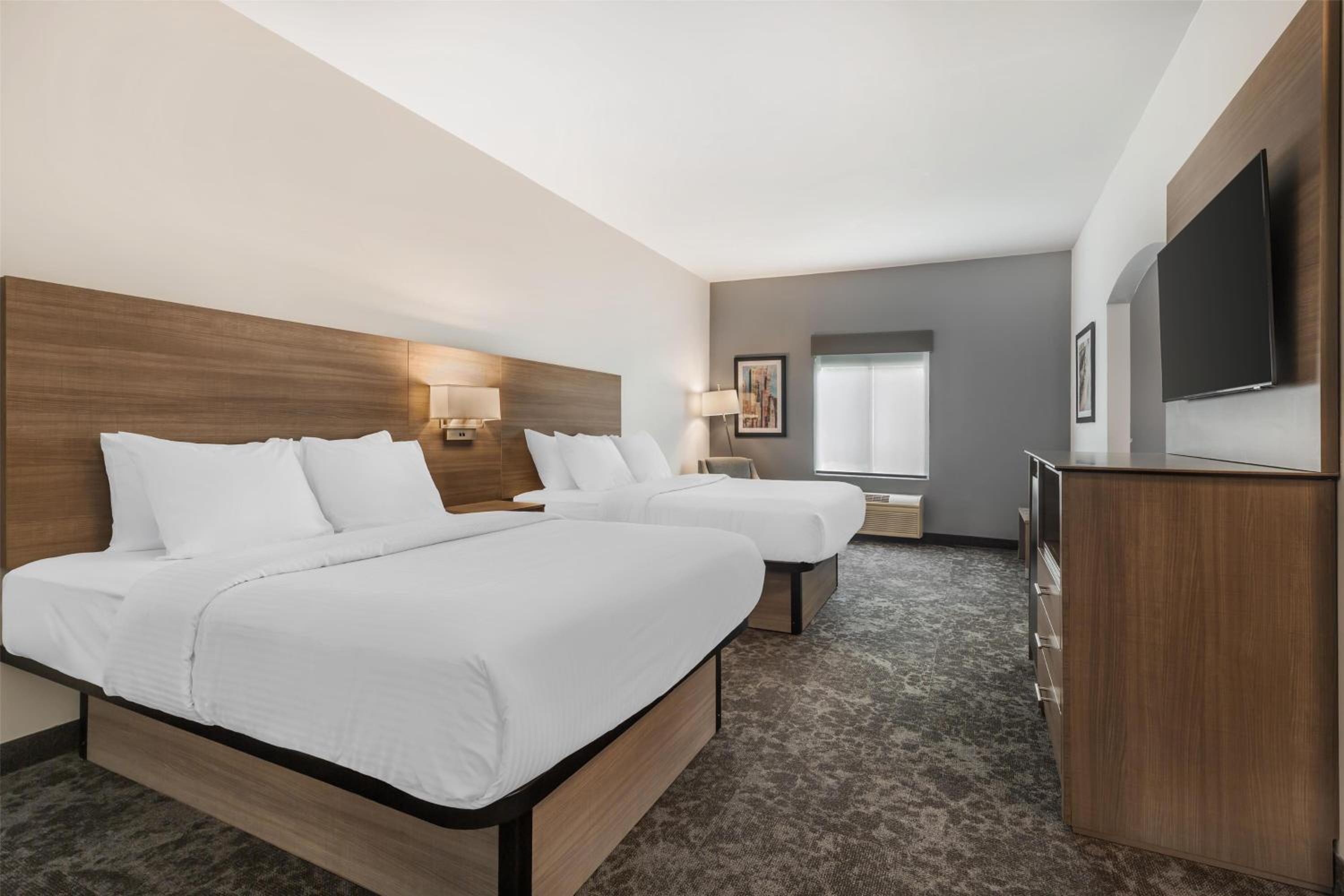 Queen Suite with Two Queen Beds, Roll-In Shower and Sofa Bed - Disability Access/Non-Smoking - Photo 1