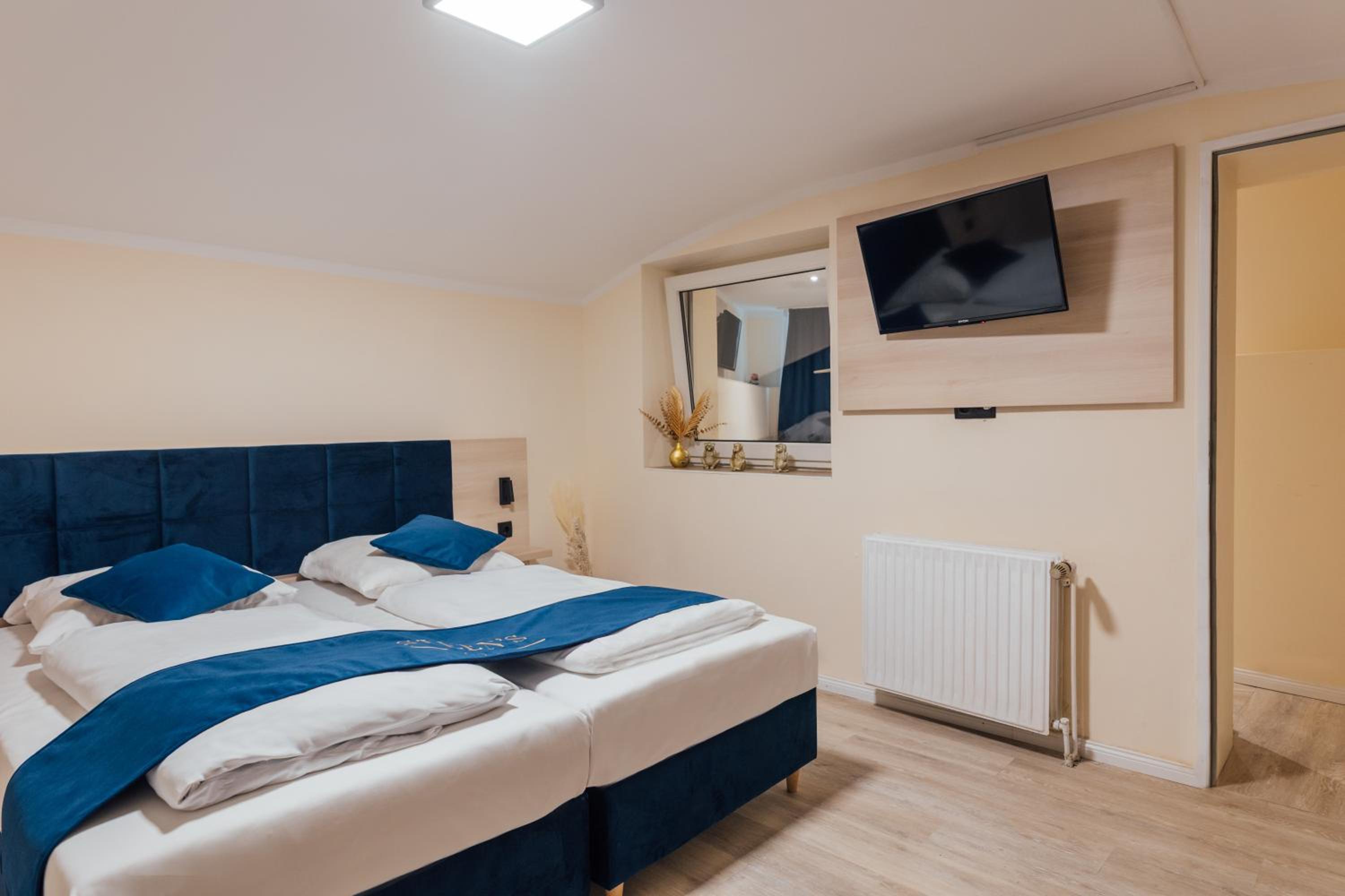 Economy Quadruple Room with Shared Bathroom