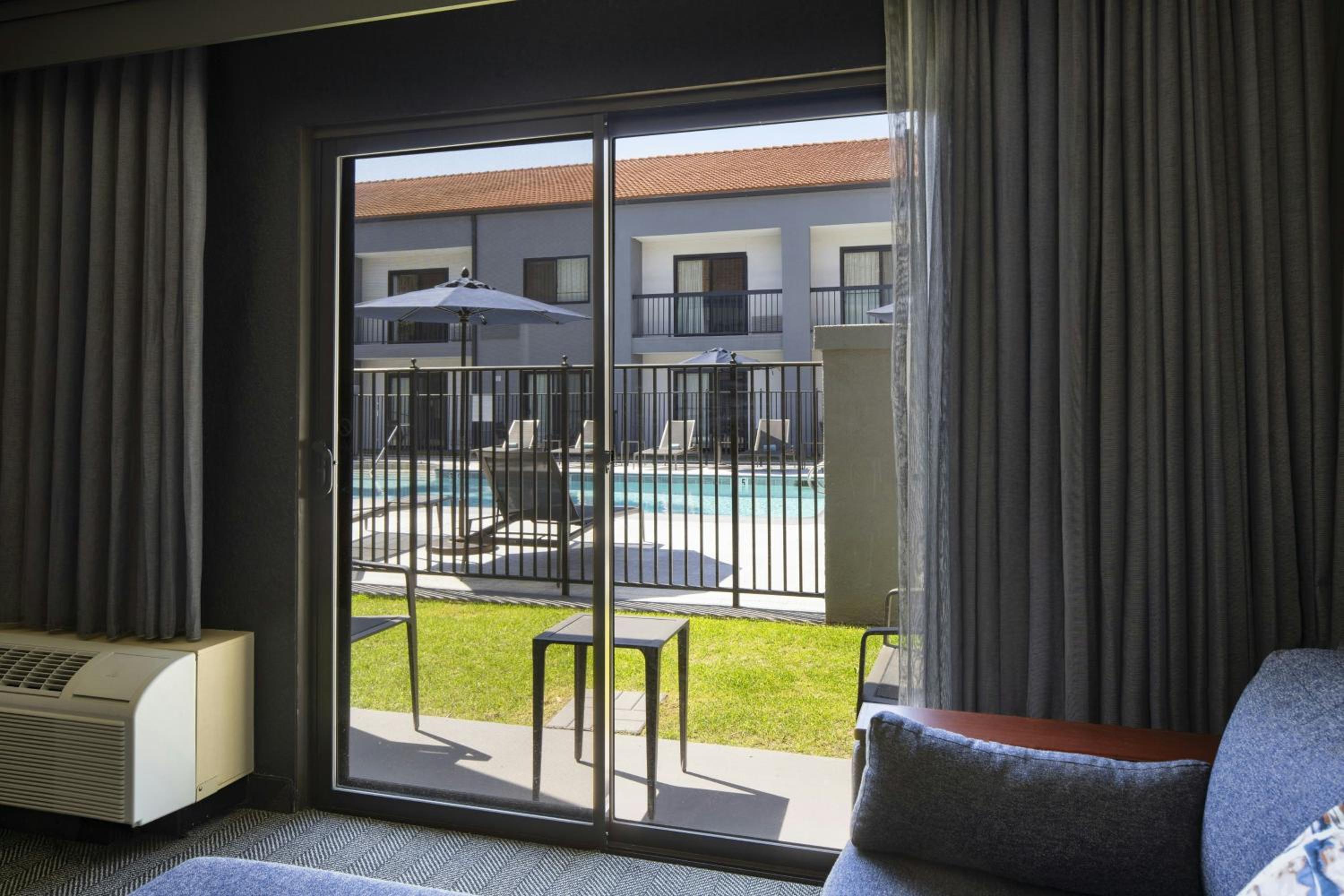 King Room with Sofa Bed, Patio and Pool View - Photo 5