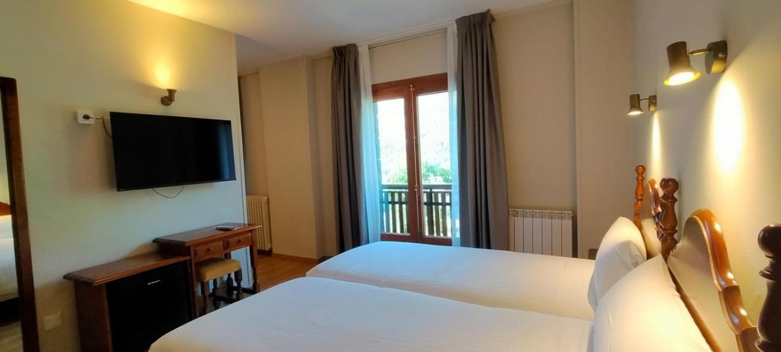 Deluxe Double Room with Two Double Beds with Balcony and Mountain View