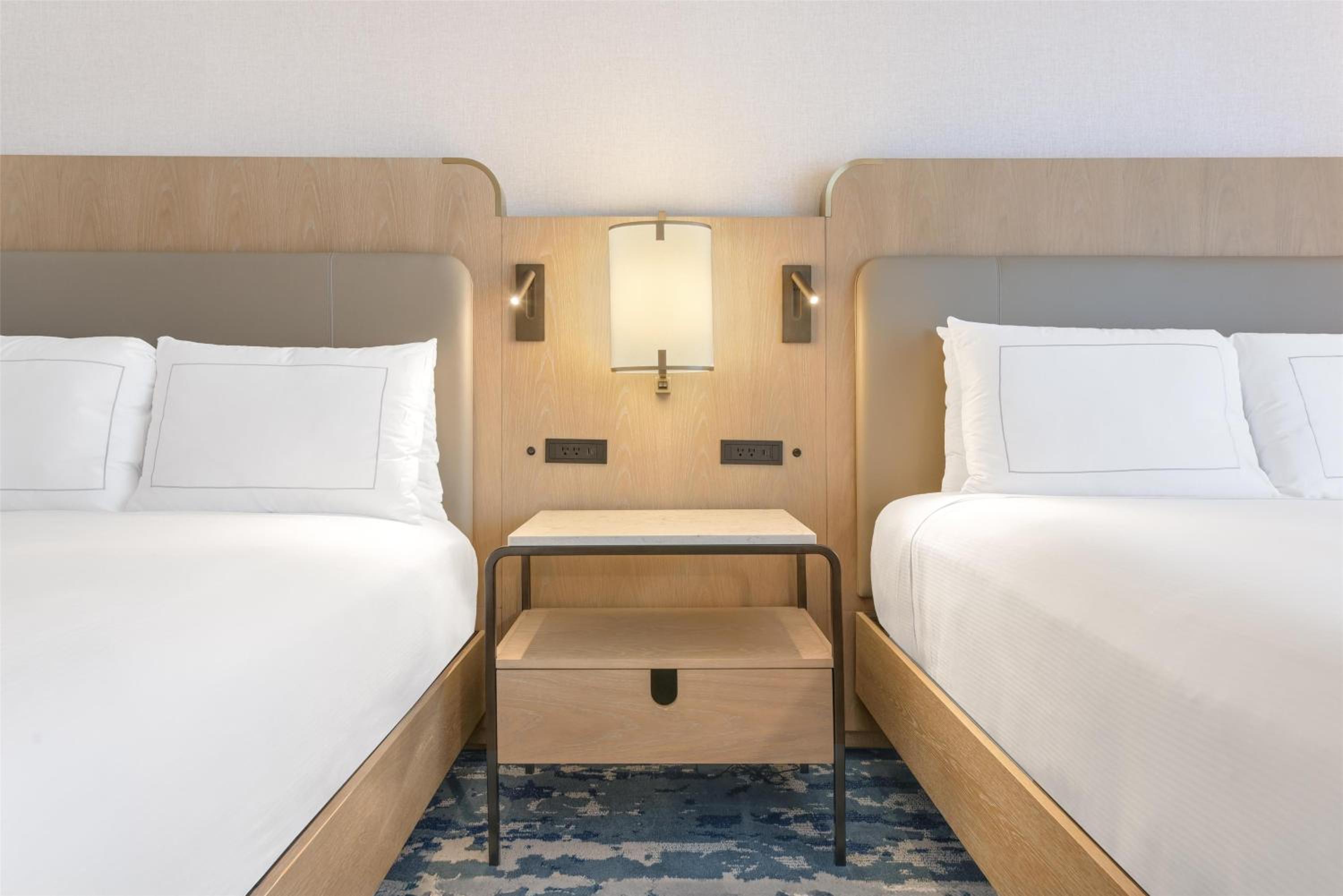 Queen Room with Two Queen Beds, Pool View and Roll-In Shower - Mobility Accessible