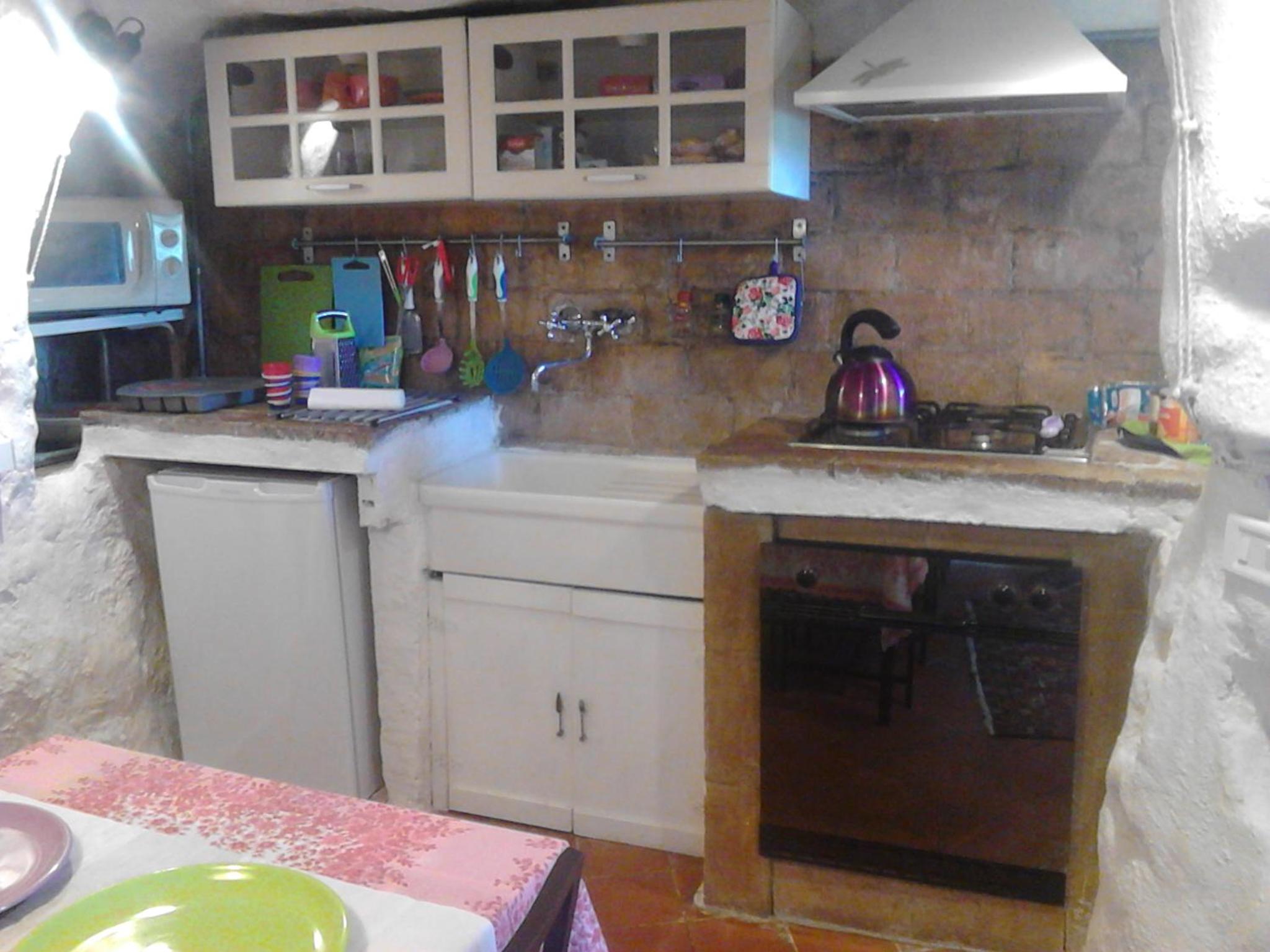 One-Bedroom House - Photo 57