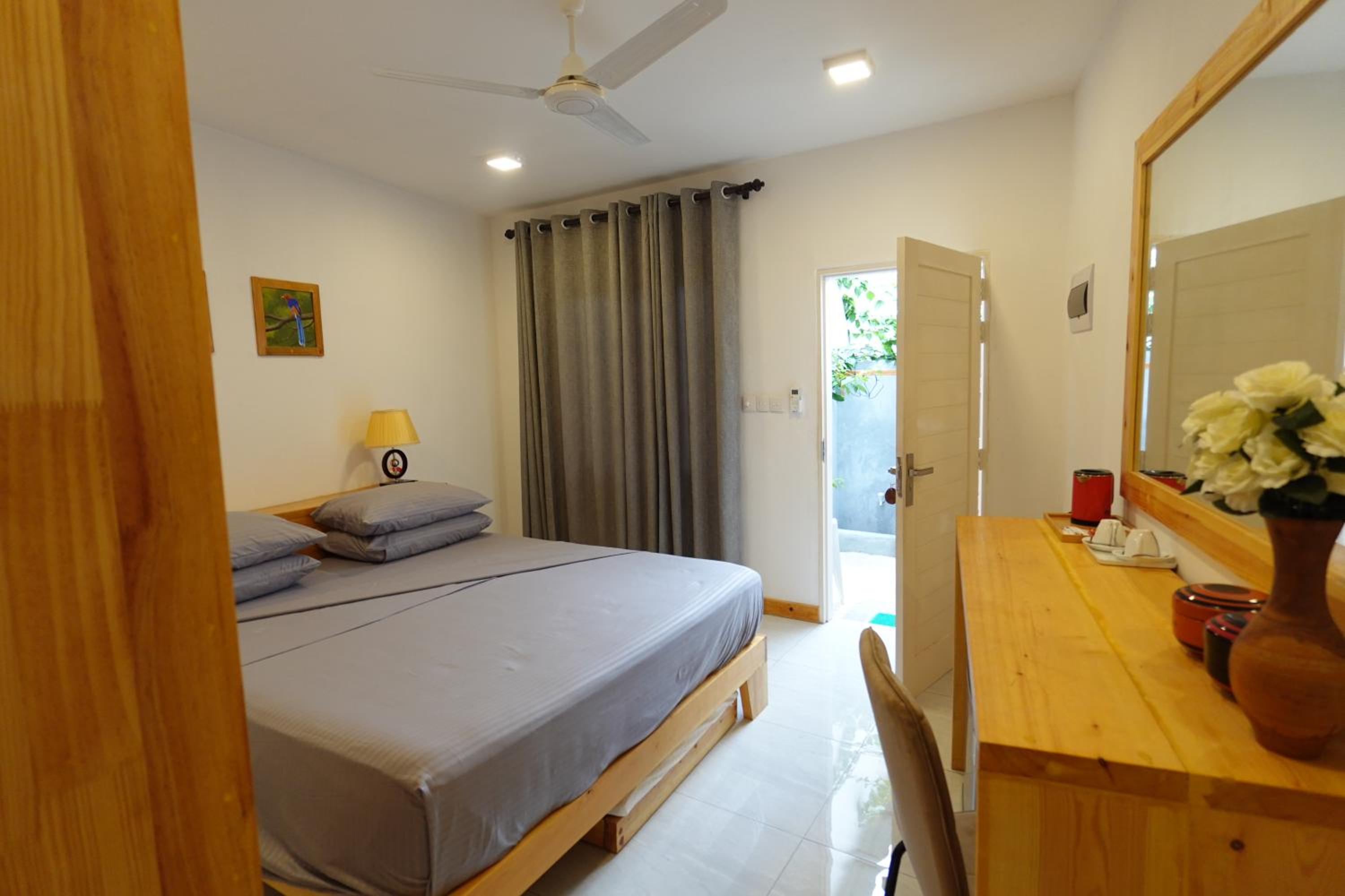 Deluxe Double Room (2 Adults + 1 Child) photo 2