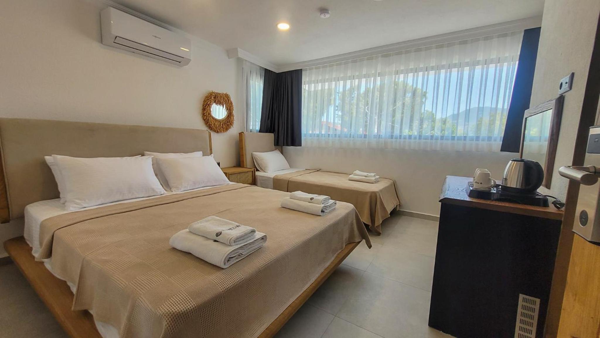 Deluxe Triple Room
