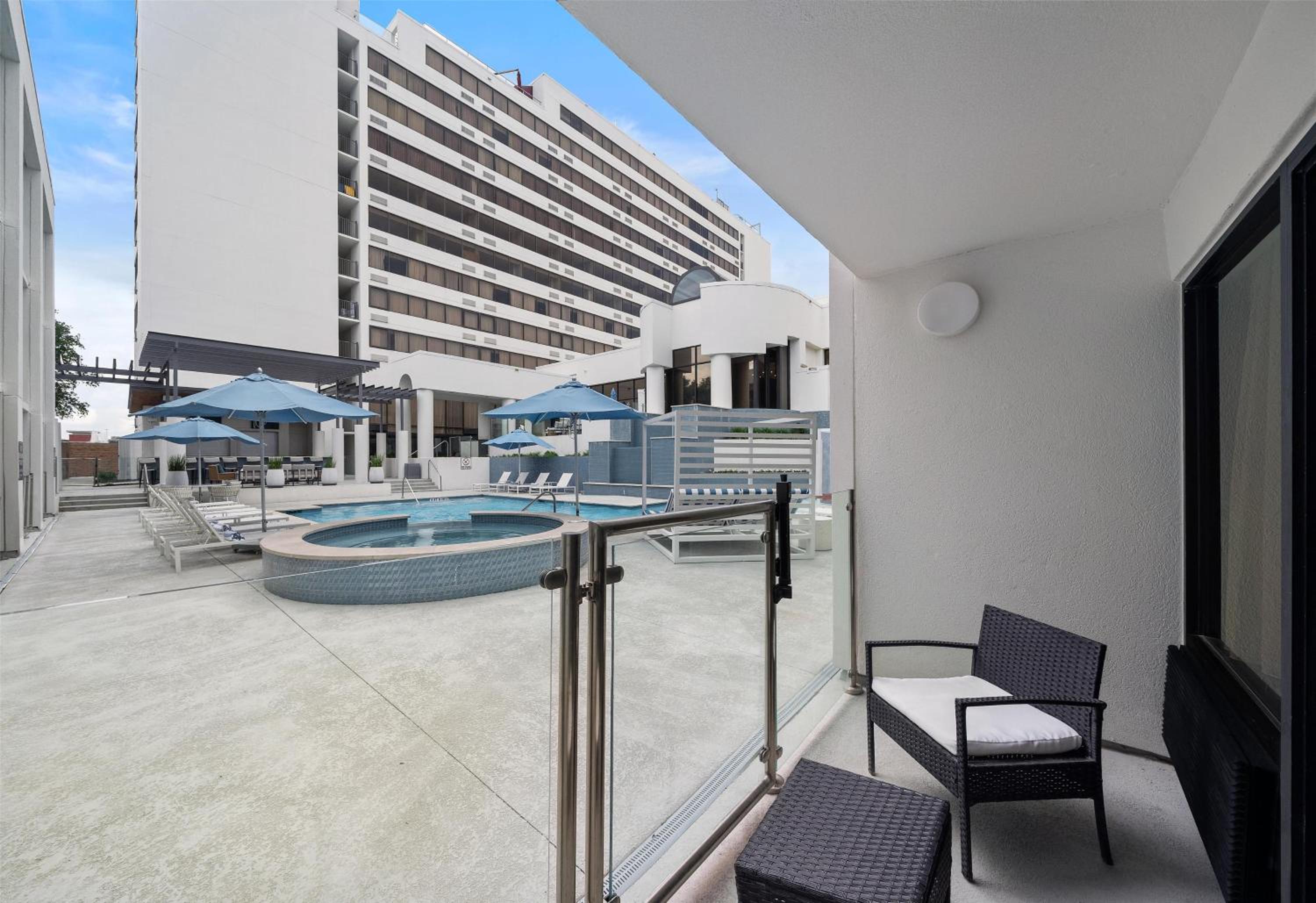 Queen Room with Two Queen Beds and Poolside/Patio - Photo 2