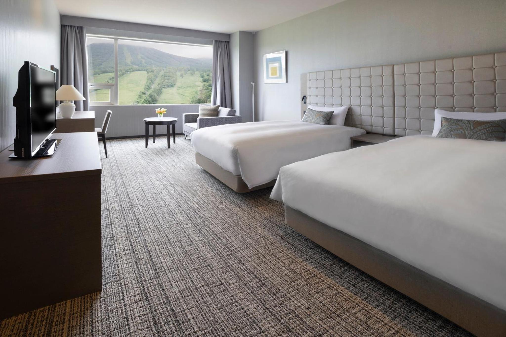 Two-Bedroom Twin Suite - High Floor - Photo 2