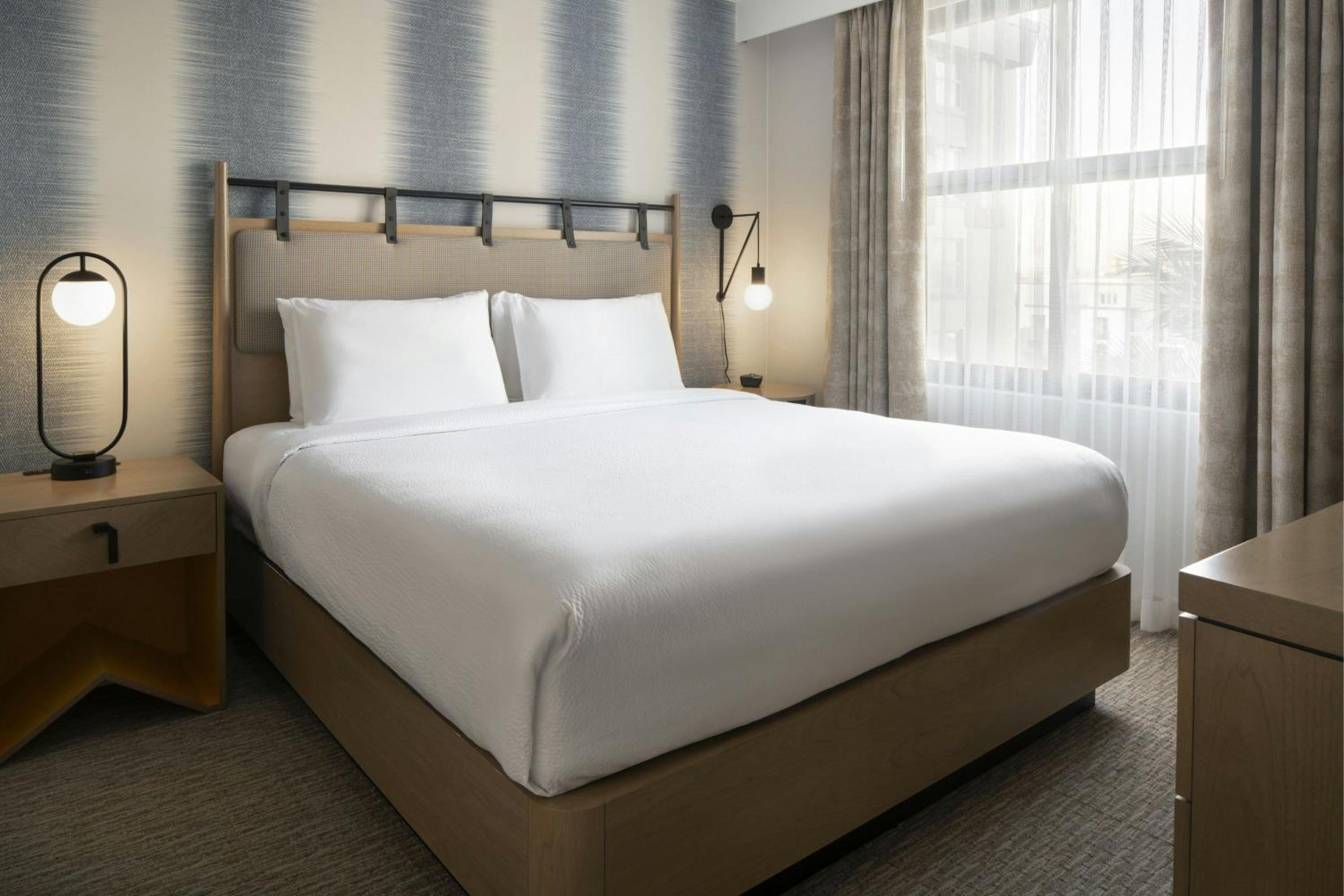 One-Bedroom King Suite with Sofa Bed  - Mobility and Hearing Accessible with Tub photo 1