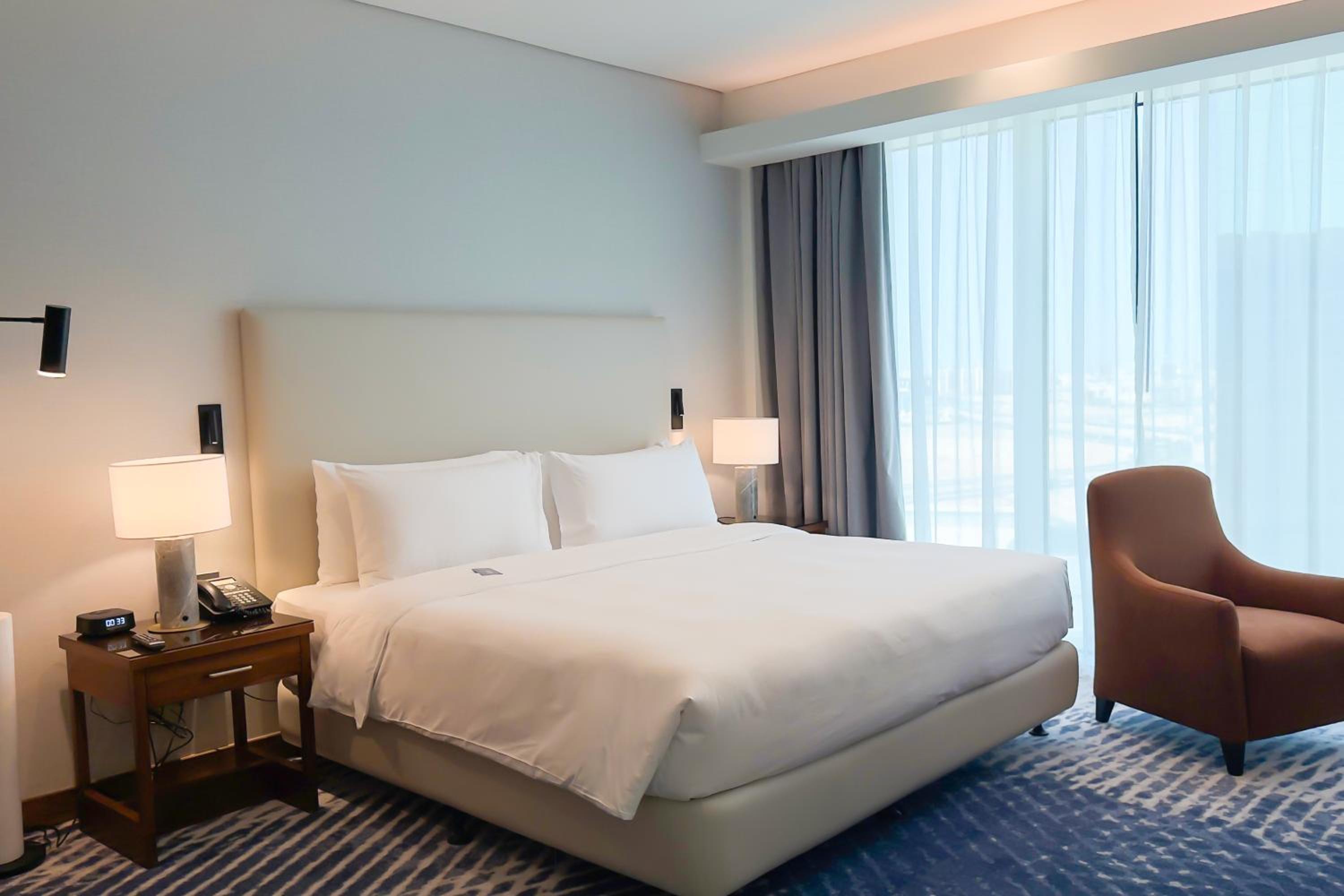 Junior King Suite with Seating Area - Photo 7