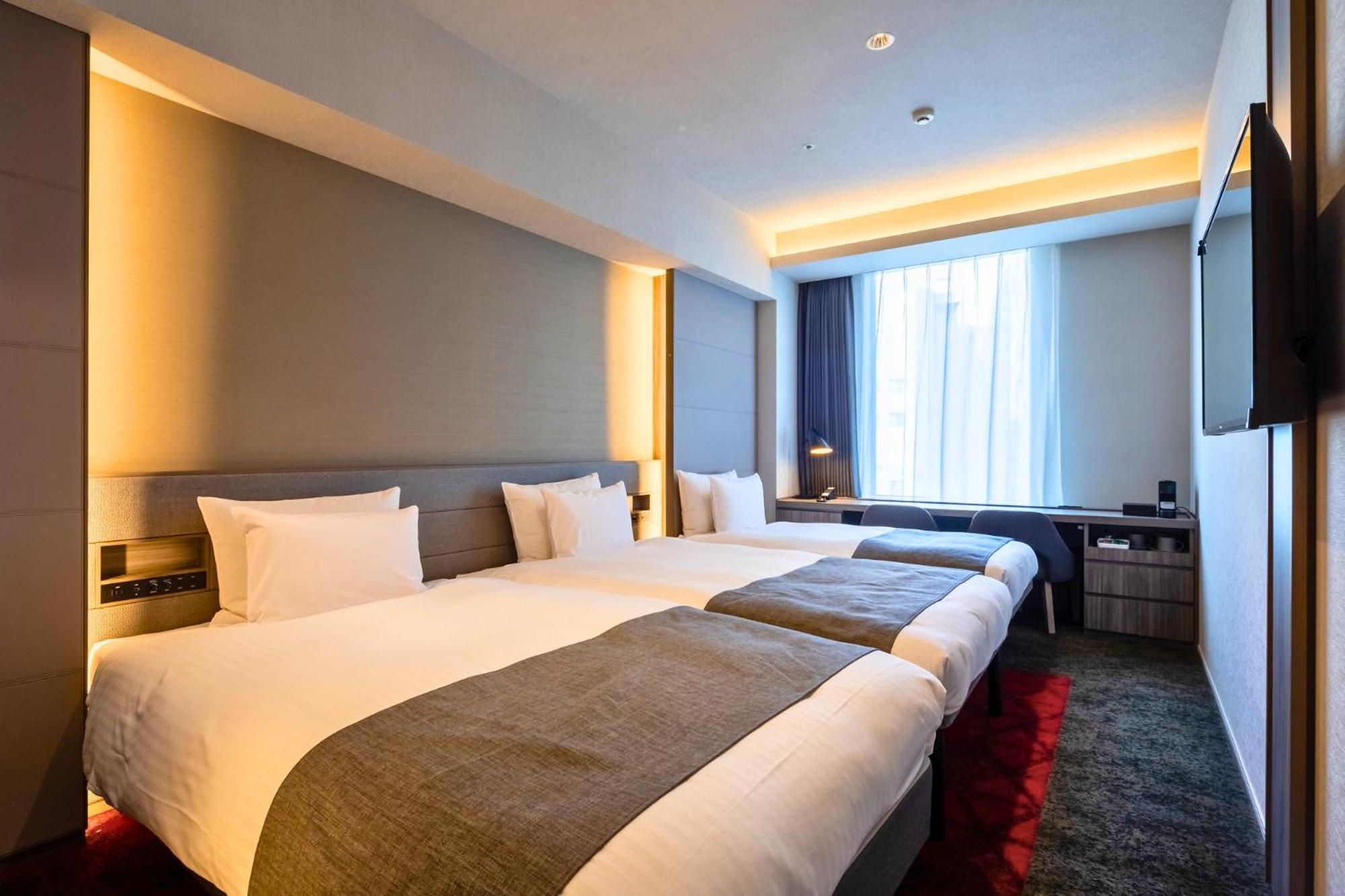 Twin Room with Extra Bed photo 3