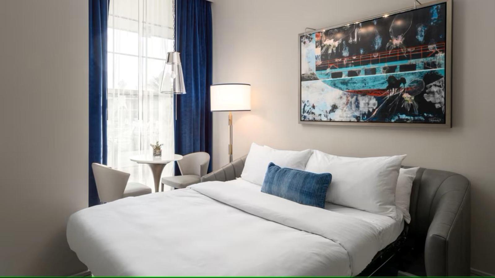 One-Bedroom King Suite with Balcony and City View