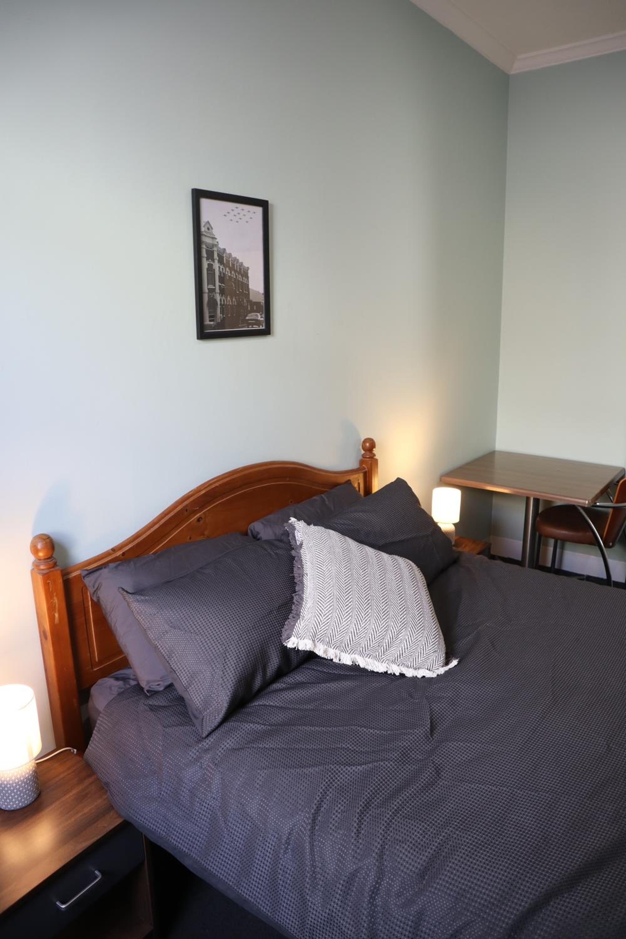 Queen Room with Shared Bathroom