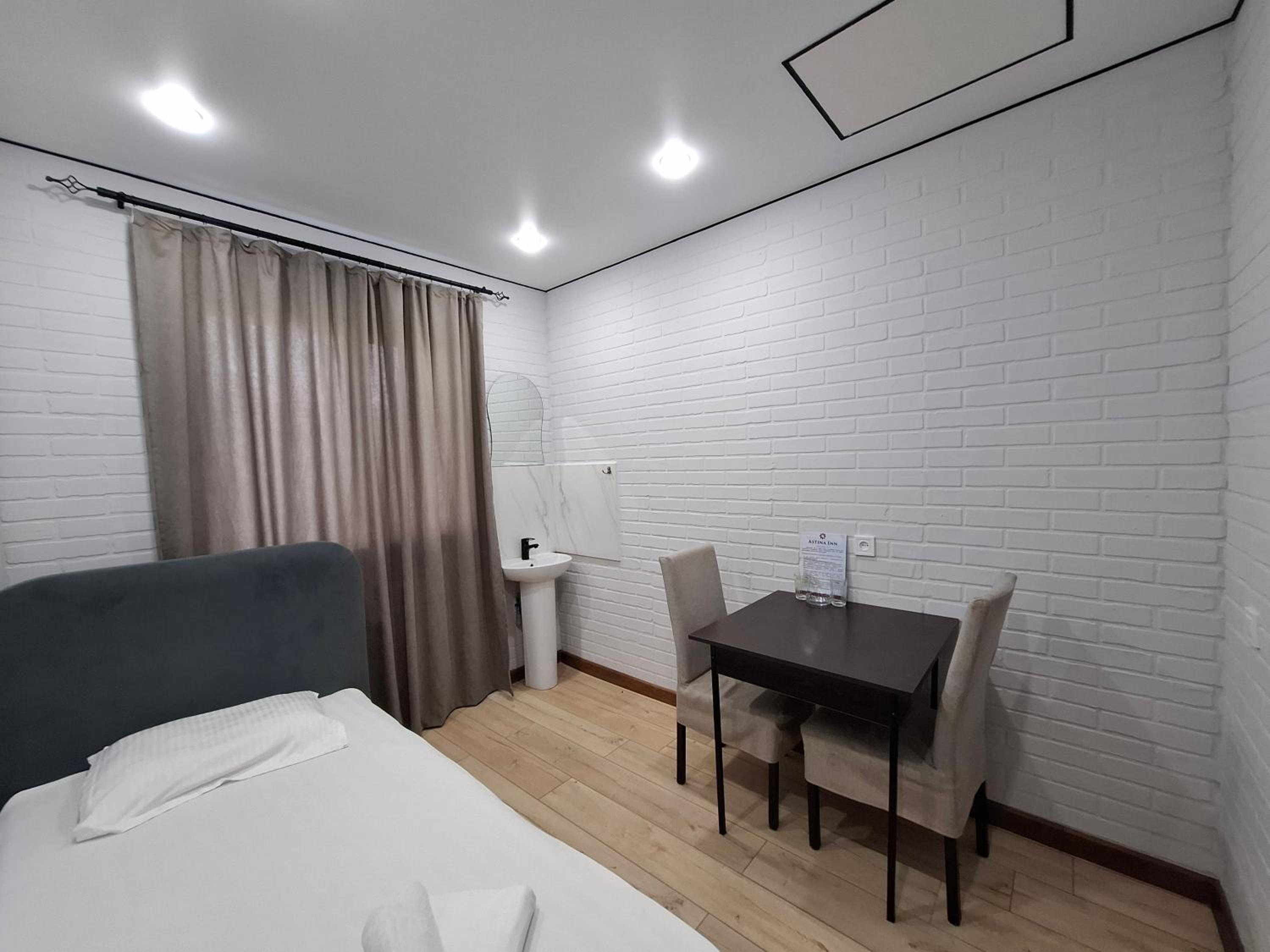Single Bed in Dormitory Room