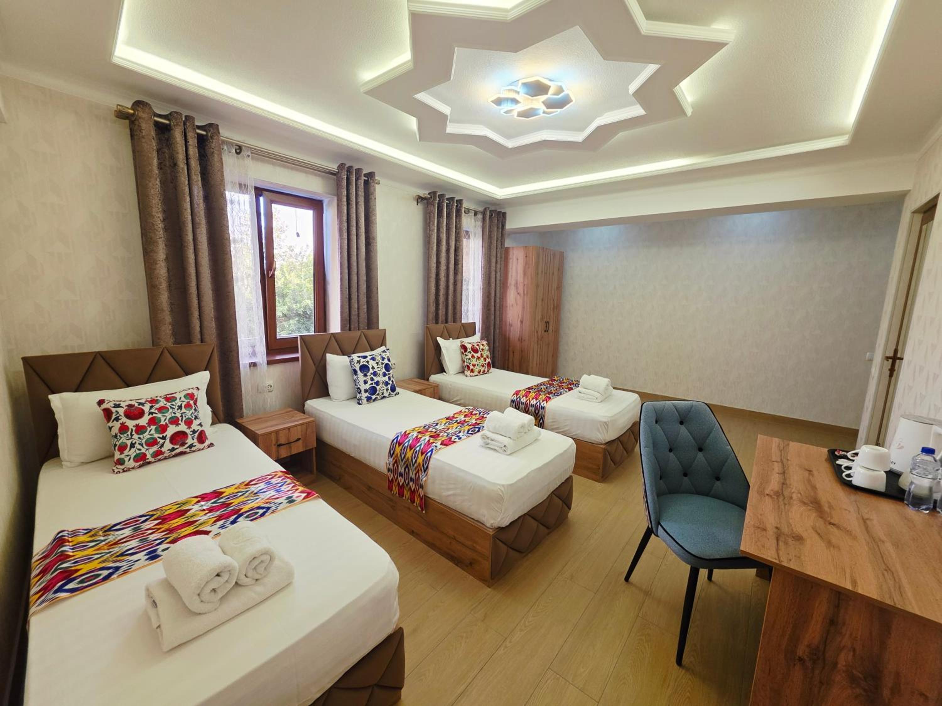 Deluxe Triple Room