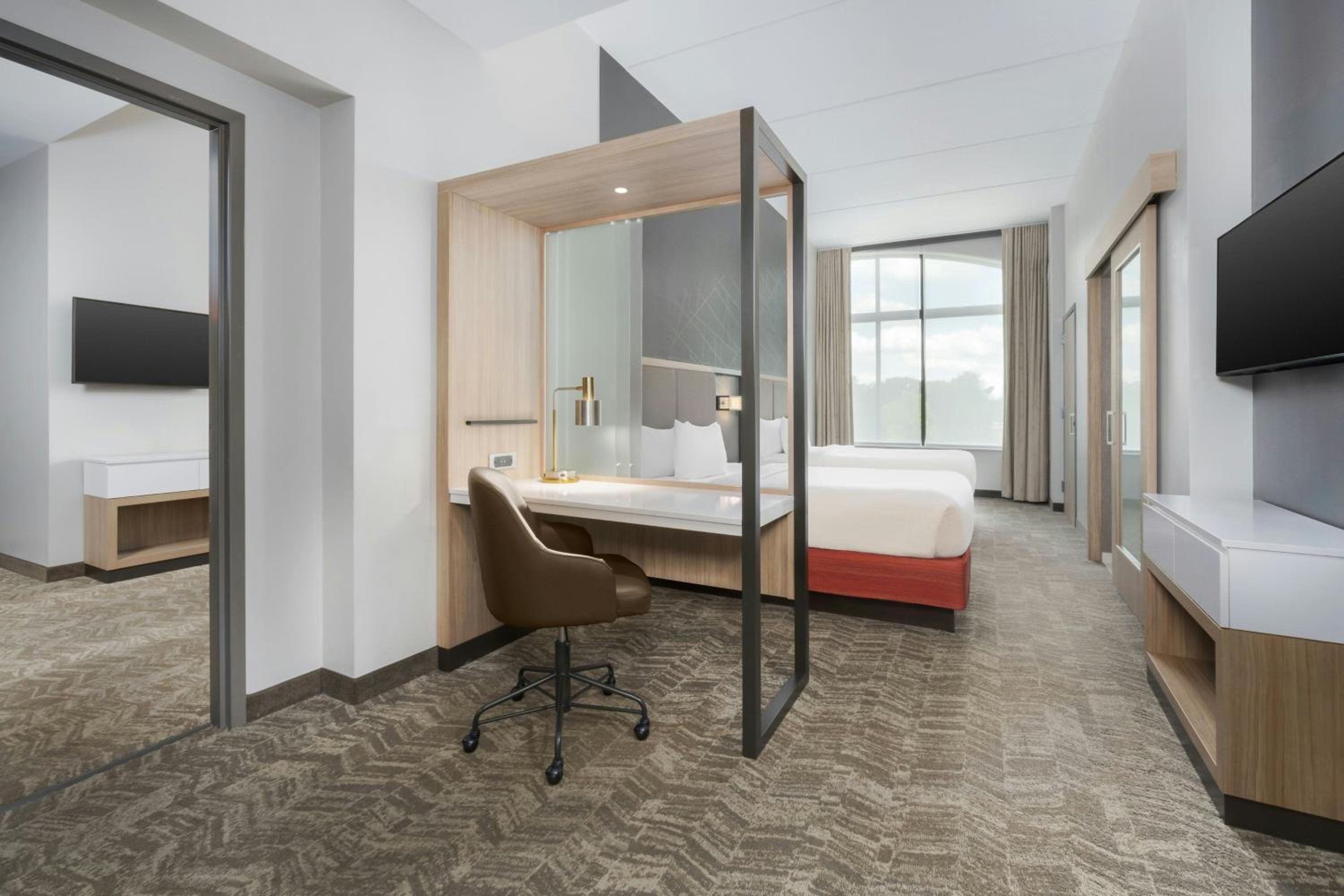 One-Bedroom Queen Suite with Two Queen Beds and Trundle Sofa - Photo 2