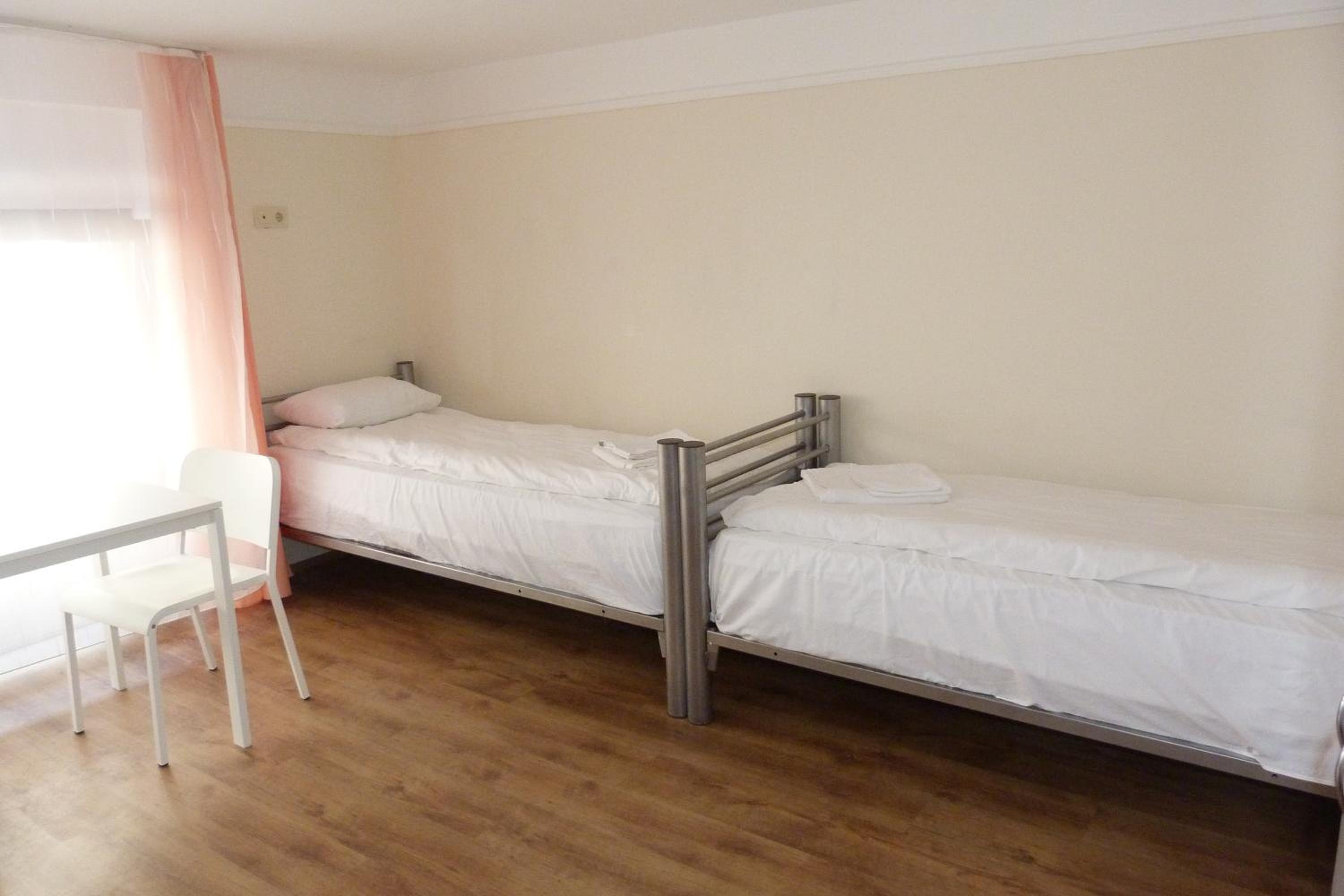 Quadruple Room with Private Bathroom - Photo 1