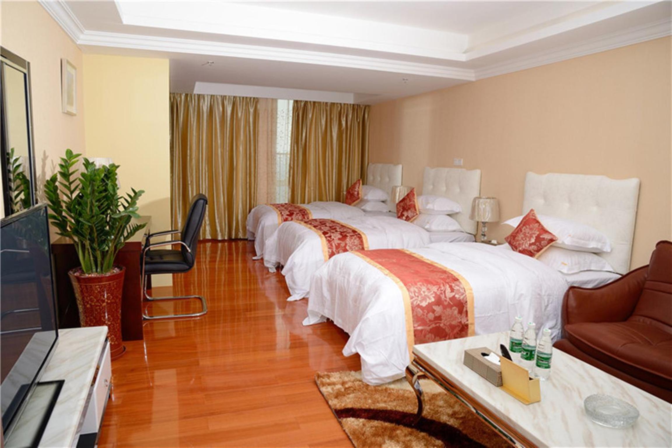 Deluxe Triple Room - Photo 9
