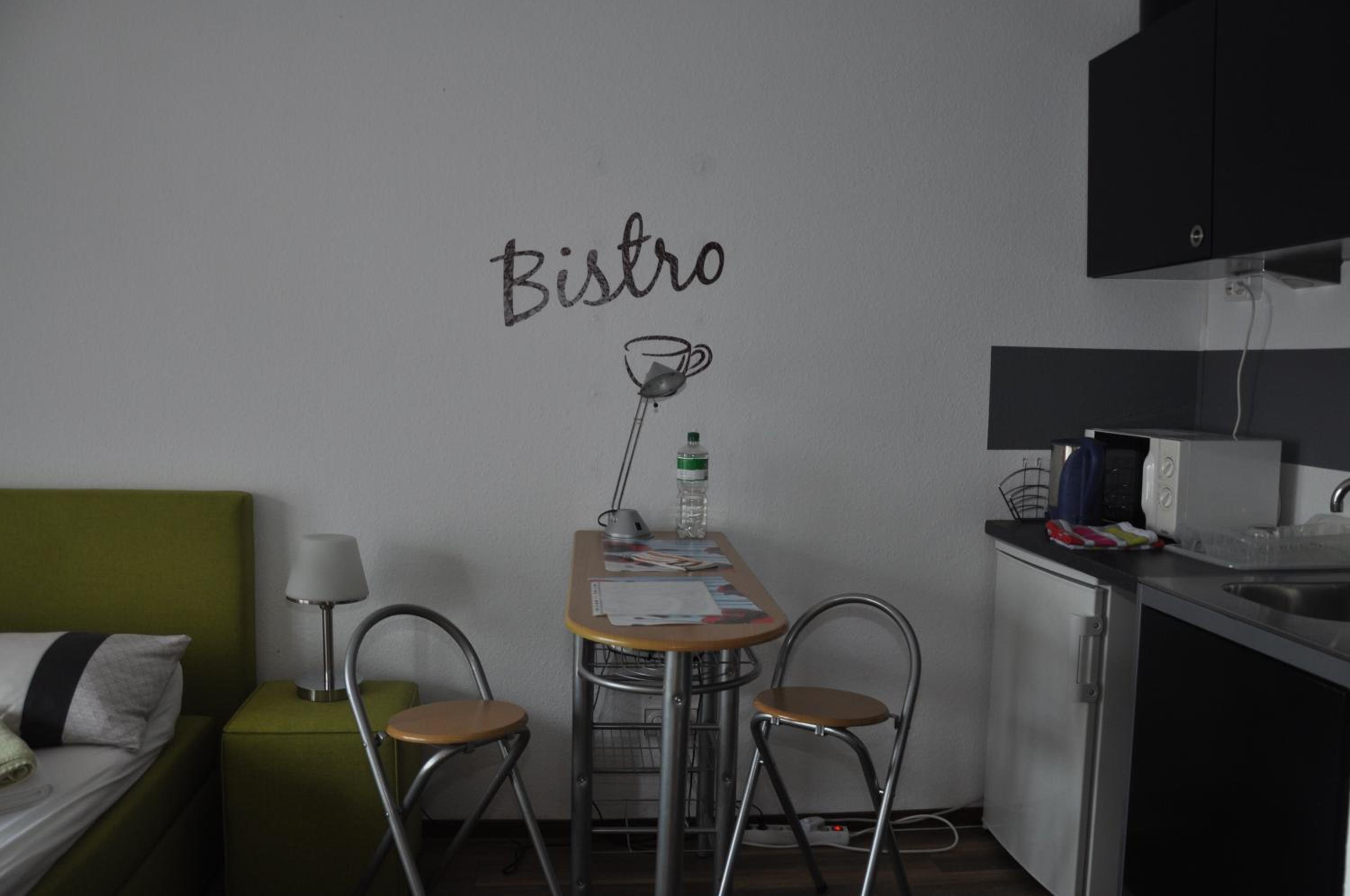 Apartment with Balcony - Photo 2