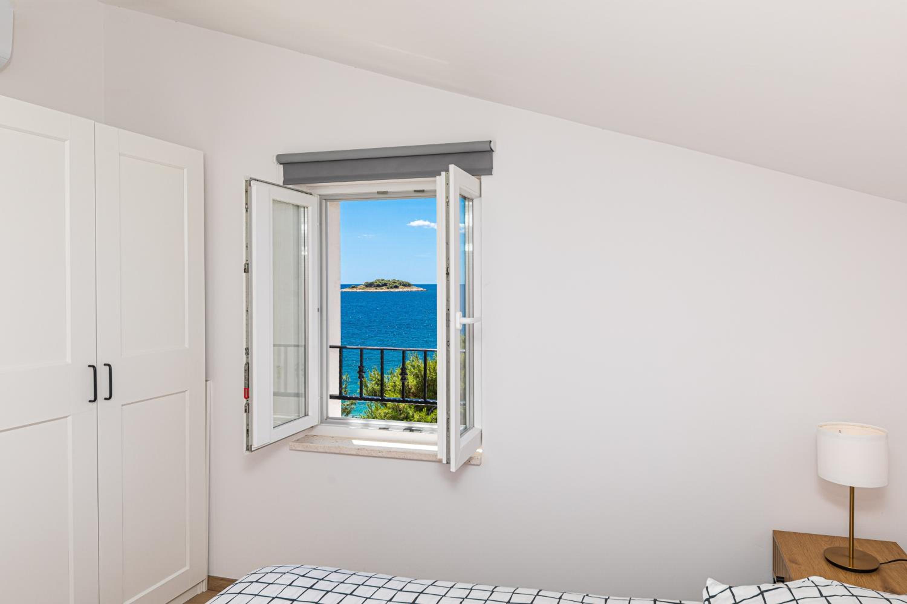 One-Bedroom Apartment with Balcony and Sea View