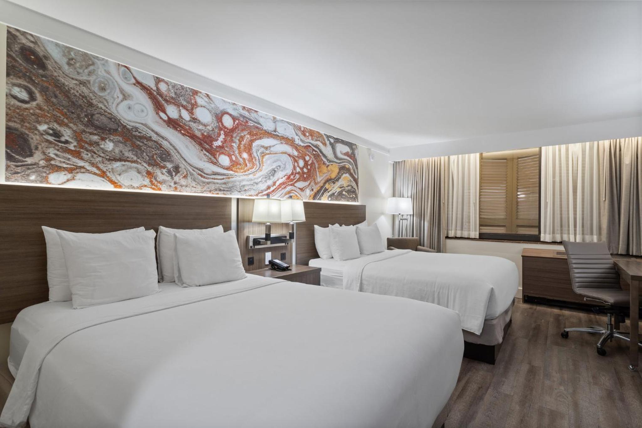 Standard Queen Room with Two Queen Beds - Photo 2