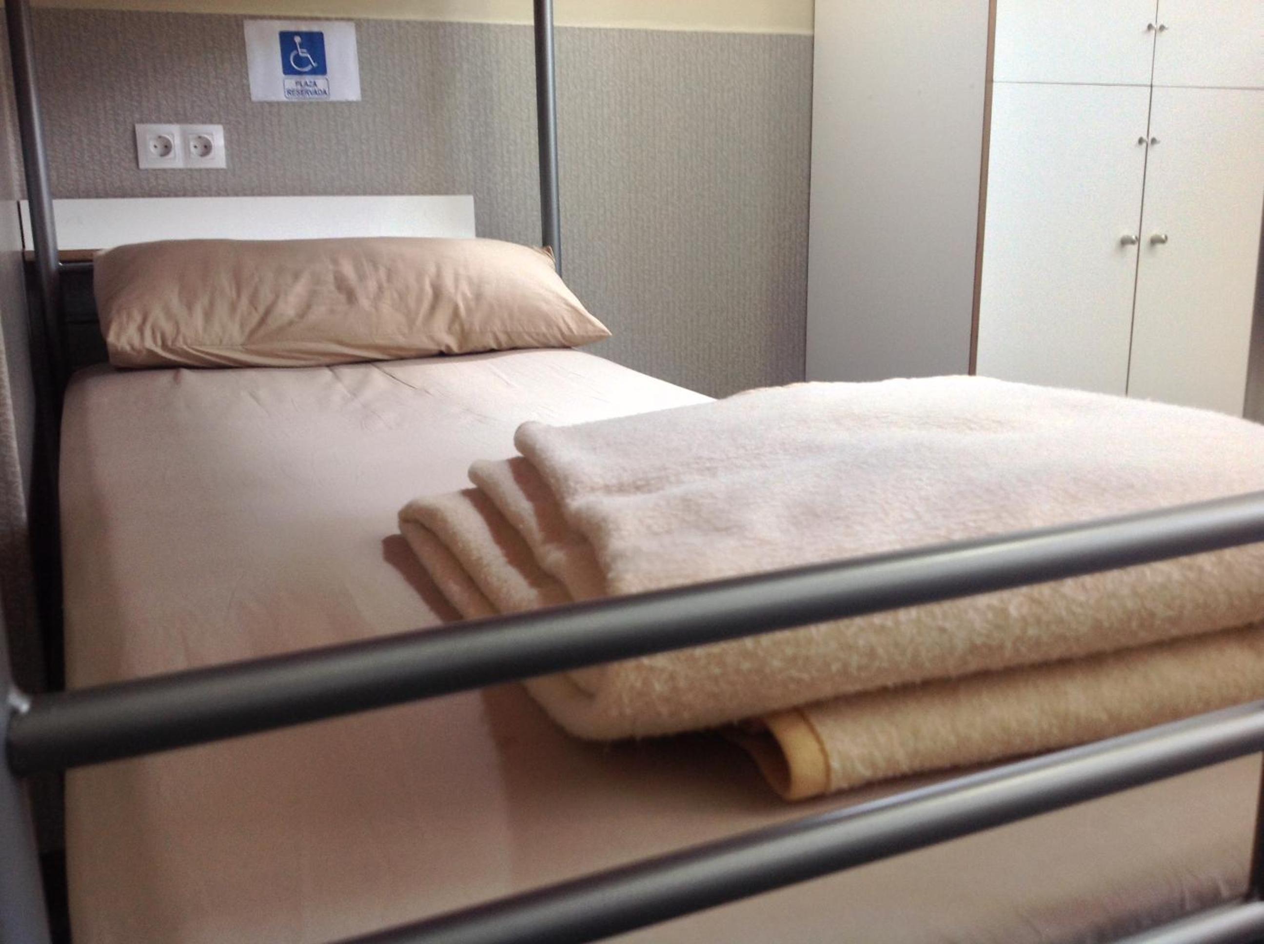 Cama en habitación compartida para 8 personas