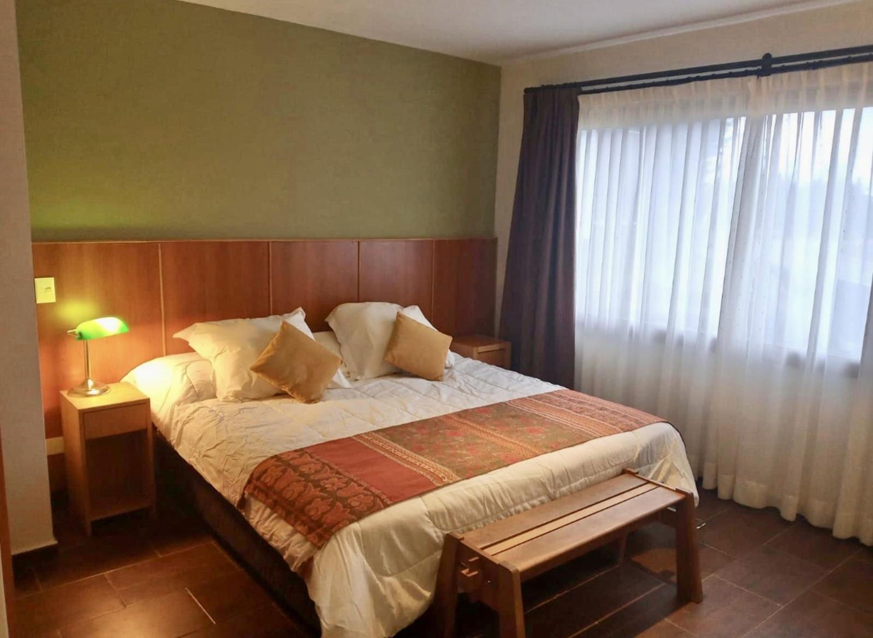 One-Bedroom Apartment with Balcony and City View